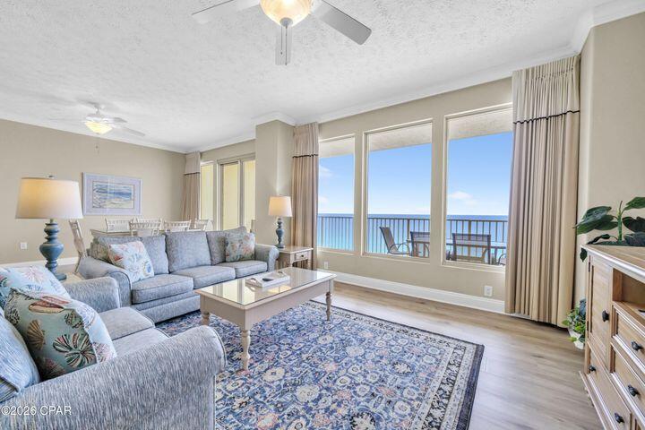 Premier Gulf-Front Living at Gulf Crest! Unit 1404 offers the coastal escape buyers are searching for. This generously sized 2-bedroom, 2-bath residence with bunk area features a highly efficient layout and an ideal mid-stack position in the sought-after 23-story Gulfcrest tower. With 9-foot ceilings, an open-concept design, and expansive sliding glass doors, the condo is flooded with natural light and showcases sweeping Gulf and sunset views from the balcony, living area, dining space, kitchen, and primary suite—creating a seamless indoor-outdoor living experience. Designed with a relaxed coastal aesthetic in mind, the home lives like a beach house while offering all the conveniences of condominium ownership.
