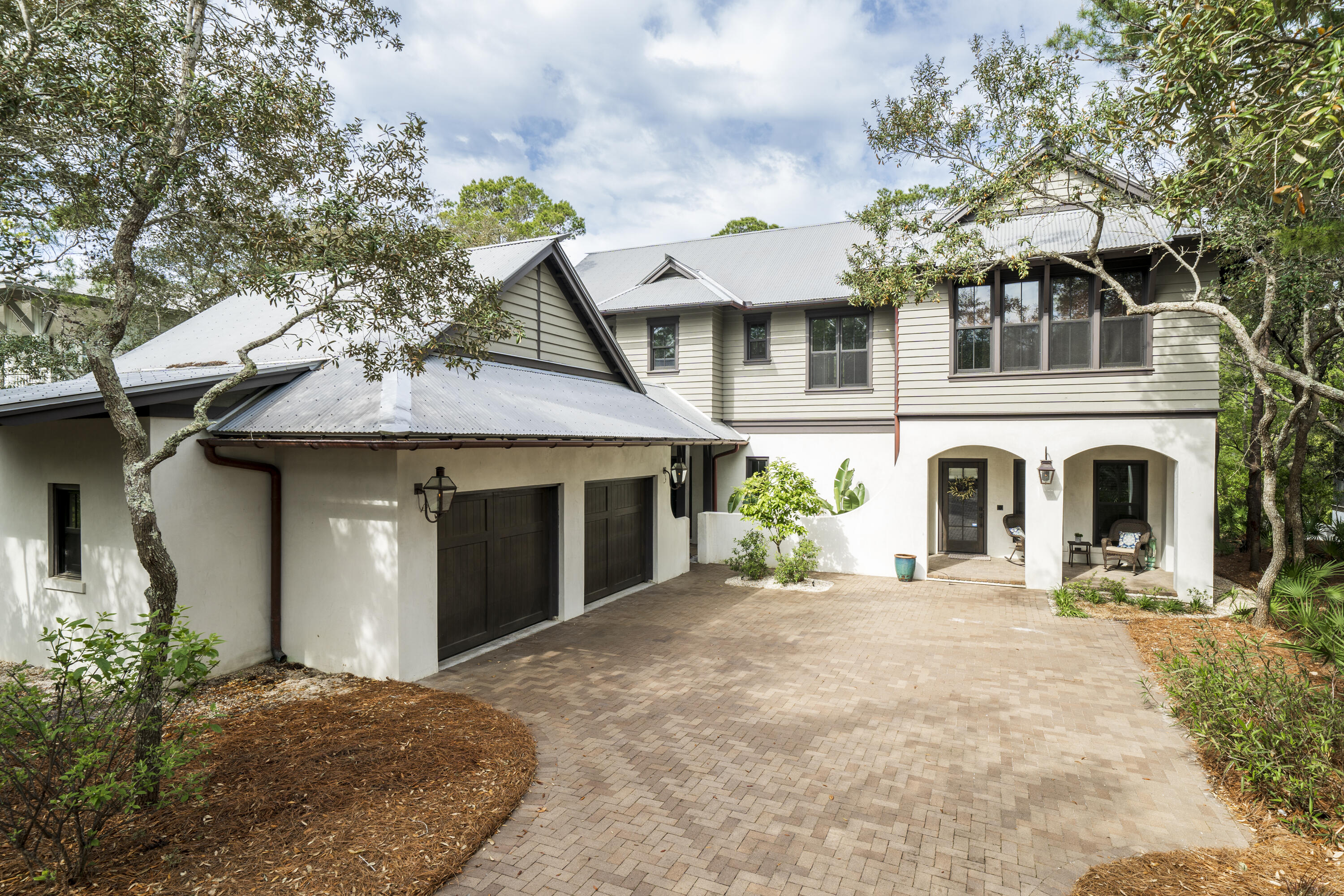 PROFESSIONAL PHOTOGRAPHY COMING SOON! Welcome to 329 Wilderness Way in the Non-rental gated community of LakePlace @ Grayton Beach. This Stately & Immaculate 4 bedroom, 4.5 bath is meticulously maintained. A major renovation has just been completed. Upon entering the foyer, you are drawn to the first level outdoor living area w/ large spa pool, covered outdoor living space and private dock on Western Lake. The ground level also in boasts a unique custom staircase, w/ hidden wine storage, brand new solid white oak floors, living room w/ bar and subzero beverage fridge.The large new laundry room w/ lots of cabinet storage, quartz countertops, ice maker, large sink & drying racks. As you ascend the staircase you enter an expansive space with vaulted ceilings and beams. The remodel included designing a large functional butler's pantry that includes a large window over the new stainless apron front sink, 36" Sub Zero refrigerator, dishwasher, wine refrigerator. All new custom cabinetry, solid marble mosaic backsplash and maple butcher block countertops.  The BP also includes a media cabinet for the whole house entertainment with 6 zone Sonos. The new kitchen boasts all new custom cabinetry, 2 new windows frame the Wolf range, with a custom hand hammered copper hood, Viking ventilation, Dacor warming drawer, Miele dishwasher, Miele speed oven, Miele steam oven and solid brass Perrin and Rowe faucet and a 48" professional refrigerator/freezer.  Three slabs of solid quartz were used for counter tops, backsplash and range wall, in this chef's kitchen. This second floor with its open floor plan affords effortless ease of living and entertaining. The high ceilings, huge living and dining space open to a large screened in porch overlooking a Western Lake canal leading out to the main lake and Western Lake outfall and beach. The newly renovated master suite also has expansive ceilings and has a gorgeous new master bathroom his and hers vanities, large shower, freestanding tub, Toto heated toilet with integrated bidet, towel warming rack and more.  The second level also has an additional bonus room which is currently a home office, The detached 2 car garage has a climate-controlled attic for storage. Pride of ownership throughout the home is reflected in the quality renovations incorporating state of the art appliances, flooring, lighting and lovely finishes throughout.  Enjoy living in the quaint secluded community located in Grayton Beach on Western Lake. Take your boat right to the beach, or kayak and paddle board right from private dock. Fish on the lake and cook the catch of the day. You will enjoy the feeling of seclusion yet convenience to the bike path, shopping, dining and the coastal towns of 30A, all while nestled away on the shore of a rare coastal dune lake. We invite you to experience this neighborhood with a wonderful community and visit with neighbors and friends at the community pool and dock. Make an appointment to see this beautiful estate home in The Lake Place at Grayton Beach.