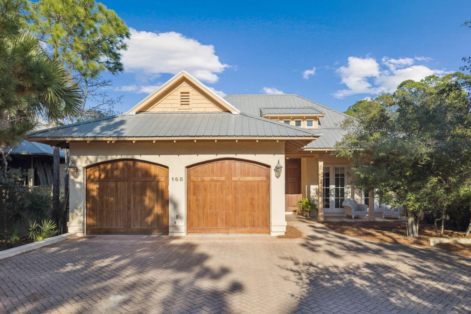 Positioned on the west side of The Retreat, 168 West Bermuda Drive offers one of the most compelling entry opportunities within this coveted, non-rental community. Built in 2004 and held by its original owner, the 2,878-square-foot residence includes three bedrooms and two-and-a-half baths, delivering immediate livability with meaningful future potential rarely found at this price point within The Retreat.

The home features a functional single-level layout with two guest bedrooms, a shared bath, a spacious living area, and a private rear primary suite with a walk-in closet and additional storage. A flex room off the kitchen, with direct garage access, serves seamlessly as an office, studio, or task space.
An unfinished lower level presents the opportunity to expand  with additional living, guest, or entertainment space. Alternatively, the existing layout aligns perfectly with growing demand for true one-level living.

Located in Blue Mountain Beach, The Retreat spans 90 acres with just 87 homesites, offering unmatched privacy, conservation areas, and approximately 1,000 feet of private Gulf-front beach. Owners enjoy a newly refreshed private beach club, private white-sand beaches, and ongoing dune restoration efforts.

Offering long-term upside, multiple paths for enhancement, and access to unparalleled amenities, this home stands as one of the most compelling ownership opportunities within The Retreat.