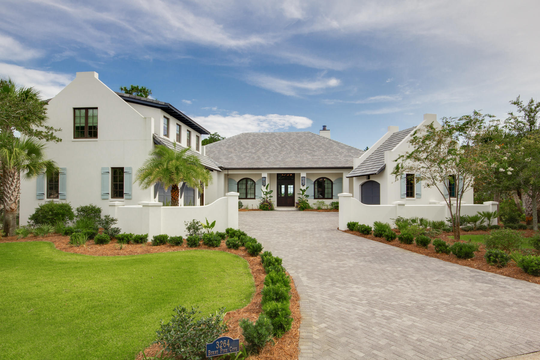 Modern touches of Pecky Cypress wood, Quartzite countertops, Coral Stone terraces and Marble accents create this Bermudan-style home. Built in the exclusive Burnt Pine Community within Sandestin Golf and Beach Resort, this home has beautiful curb appeal and a coastal elegance that is unlike any other home in the community.
Spend your time hosting and entertaining in the gourmet kitchen space with custom cypress cabinetry, a Wolf range, Sub-Zero fridge and quartzite countertops. Hang out in the family room with a wet bar, raised Pecky Cypress beamed ceilings and a beautiful stone fireplace. Lounge poolside in your private heated saltwater pool and outdoor entertainment area with summer kitchen and grill overlooking the green and the fairway of the beautiful 16th hole of the golf course. The expansive master suite has a fireplace, large walk-in his/hers closets and a spacious ensuite with matching vanities, a large tile shower and an Air Jetted tub. This property is fitted with a temperature controlled wine cellar, a Control4 system, a Sonos Sound System, a full house generator and an abundant amount of storage and space. The 3-car garage has an additional guest suite above that has 1 bed, 1 bath and a kitchenette.

In the community of Burnt Pine, Residents have access to all of the master amenities within Sandestin, including hotel accommodations, meeting facilities, world class golf, a bayside marina, dining, shopping and beach access. Burnt Pine offers additional gated security to ensure residences privacy and peace.