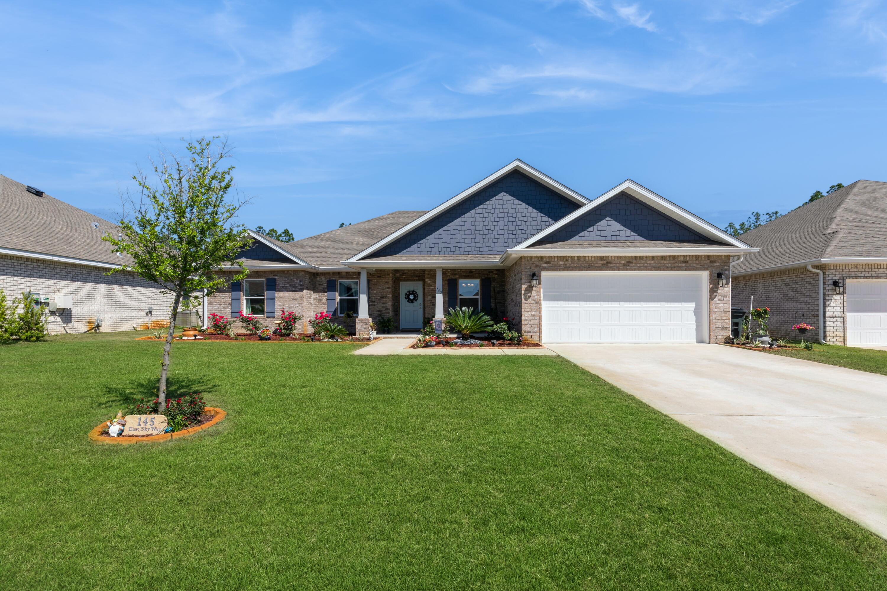 4.25% VA Assumable Loan to qualified VA eligible buyers using their own entitlements. Welcome to this spacious 4 bedroom, 3 full bath newly built home in the recently completed Parkview neighborhood of Hammock Bay! Upon entering the home from the expansive covered front porch, one of the first notable features is the beautiful wide plank luxury vinyl flooring spanning throughout all main living areas. Homeowners have the option of entertaining guests in the formal dining room or keep it casual by hosting in the open kitchen/breakfast nook that overlooks the spacious family room and private backyard with full pond views and a gorgeous tree-line in the background. The owners retreat creates a space for rest and rejuvenation away from the other living spaces in the home.  Located on the other side of the home are 3 total additional bedrooms that are separated by the living room, each side equipped with its own full bathroom creating a sense of true secular living for all. The fully fenced in backyard is an inviting area to create memories outside of the home!
Hammock Bay is a premier, bayfront master planned community located just 15 minutes north of the white sand beaches of the Emerald Coast. Within the confines of the neighborhood is a 6,000 square foot clubhouse that offers residents use of the movie theatre with auditorium seating, a full caterer's kitchen to include wet bar and dining area, childs play room, and lounge overlooking the lake and pool area. Numerous on site workout and fitness facilities, competition lap pool, additional 3 Resort-style pools, pickleball courts, tennis courts, basketball court, a putting green, large playground, outdoor kitchen/gas bbq areas, surround the club house and pool making it an outdoor haven for the whole family to enjoy harmoniously. Sprinkled throughout the community are multiple catch and release stocked ponds, dog parks, both paved and primitive walking trails, General Store and Brewery, an additional bay front club house with fishing pier extending 500' in to the bay, an amphitheater like stage with jumbotron screen, with lots more on the near horizon! All residents at Hammock Bay will enjoy year-round social events as well as a vibrant and active Town Center.