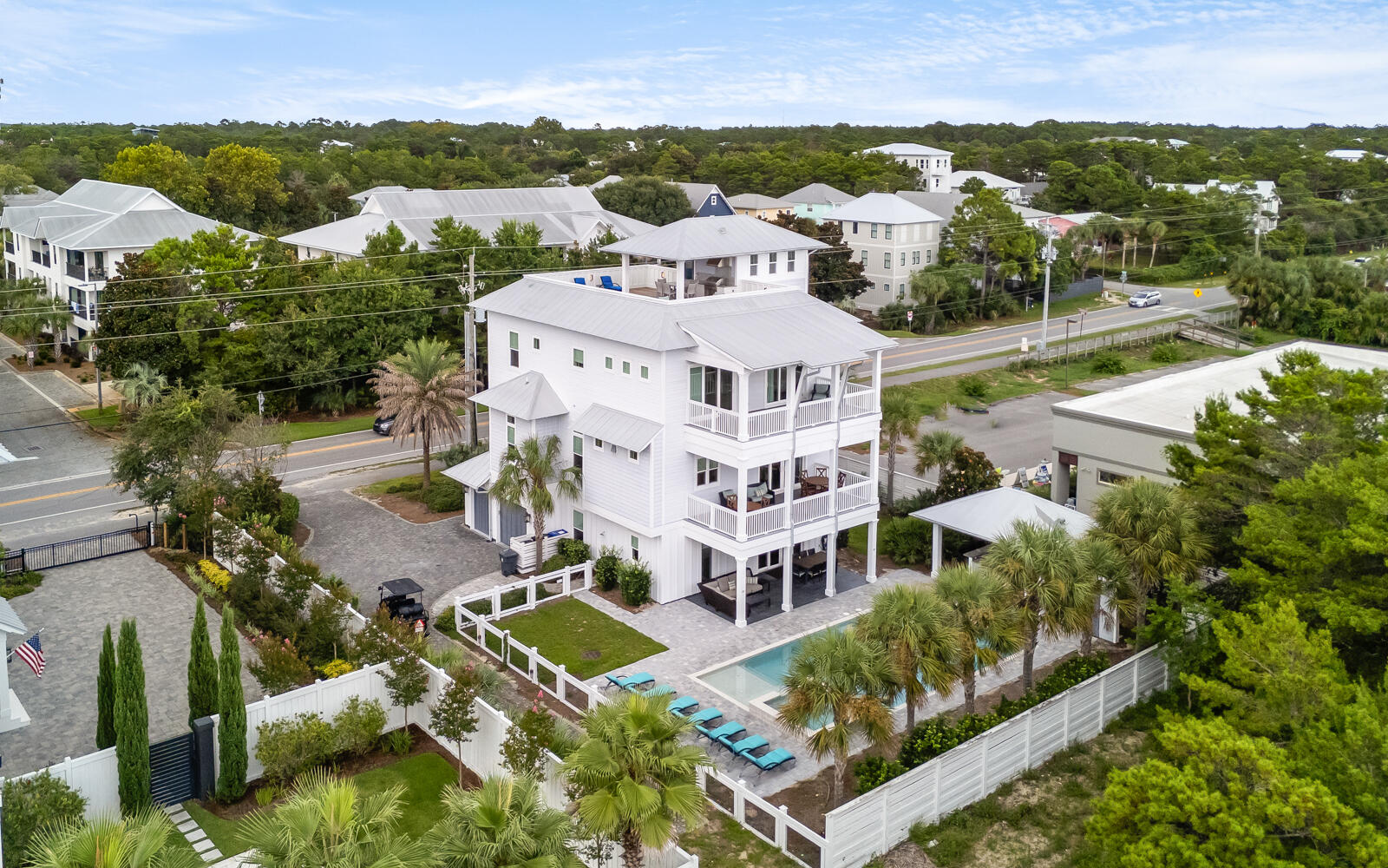Located on the highly sought after west end of Scenic Highway 30A, this stunning home offers elevated coastal living with exceptional space, thoughtful design, and outstanding income potential. This seven bedroom, eight bathroom, four-story residence spans 5,622 square feet and was designed as a true family retreat, ideal for multigenerational living or as a premier short-term rental with projected annual income exceeding $250,000. 

Professionally styled with coastal contemporary finishes, the home blends refined elegance with relaxed comfort. A private elevator services all four levels, providing effortless access throughout, while expansive indoor and outdoor living areas create the perfect balance of gathering spaces and private retreats. Outdoor living rivals a luxury resort. A private pool with spillover spa anchors the backyard oasis and is complemented by a covered outdoor kitchen, lounge area, and private yard that's ideal for entertaining. Above, the rooftop sun deck delivers sweeping Gulf and sunset views and features a covered outdoor kitchen, dining area, and ample seating to enjoy ocean breezes and unforgettable evenings.

Inside, this home offers three separate indoor living and entertainment areas, allowing space for everyone to relax. The main living room is grand yet inviting, featuring comfortable seating and a gas-burning fireplace. The chef's kitchen is fully stocked and designed for large gatherings, complete with professional-grade appliances, a six-burner gas range, dual dishwashers, ice maker, generous cabinetry, and an oversized island. The adjacent dining area comfortably seats up to twenty guests, making it ideal for family celebrations and entertaining. 

The inverted floor plan enhances views and functionality throughout the home. The first floor is designed as an entertainment hub with a living area, TV, foosball table, games, and a mini kitchenette, along with direct access to the pool and outdoor kitchen. This level includes a queen guest bedroom and a spacious bunk room sleeping up to ten, with each bed featuring its own television. 

The second floor serves as the main living level, housing the kitchen, dining, and living areas, along with two king bedrooms, each with en-suite baths. The third floor features an additional living area, two king suites, and a family suite with a queen bed and twin bunk, all with private baths that provide excellent separation for owners and guests alike. The fourth-level rooftop deck completes the home as a premier gathering space offering expansive Gulf views and postcard worthy sunsets. In total, the home features seven bedrooms and seven and a half bathrooms, including five king suites with spa-inspired en-suite baths, two additional guest rooms, and multiple balconies with outdoor seating. 

Ideally positioned approximately 0.3 miles from the Gulfview Heights Beach Access, residents enjoy convenient access to parking, restrooms, showers, picnic pavilions, and seasonal lifeguards. Blue Mountain Beach is known for its relaxed, family-friendly atmosphere while remaining close to Gulf Place, Grayton Beach, Seaside, and an array of dining, shopping, and outdoor activities along Scenic 30A. A rare opportunity to own a luxury Gulf-view home on 30A that seamlessly blends lifestyle, thoughtful design, and exceptional investment potential.