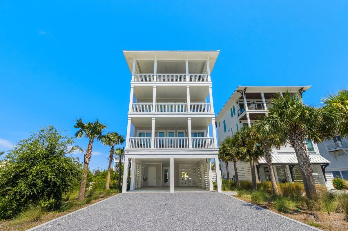 Experience effortless coastal living in this stunning North Cape San Blas residence. This four-story home offers five bedrooms, five-and-a-half bathrooms, and accommodates up to 14 guests, making it perfect for extended family or entertaining friends.

The ground level features a tiled entry with beach gear storage, a private heated pool, outdoor shower, and space for lawn games. Two king bedrooms with ensuite baths and a kid-friendly bunk room are located on the second floor, along with porch swings and partial Gulf views.

The third level includes a casual lounge with an arcade game, corner sofa, and TV, as well as the primary suite and an additional king bedroom, both with private baths and access to furnished decks. A dual washer and dryer setup adds convenience for larger groups.

The top floor boasts vaulted ceilings and multi-toned wood floors in the open living and dining areas, framed by striking Gulf views. A gourmet kitchen with high-end appliances, an eight-seat breakfast bar, and a twelve-seat dining table is ideal for entertaining. Additional features include a wet bar, expansive deck with alfresco dining, and a Gulf-facing balcony perfect for sunsets.

Entertainment and comfort continue outdoors with multiple lounge areas, a ping-pong table, fire pit, outdoor TV, and abundant seating. Additional amenities include an EV charging station and easy access to the beach just across the street. This property offers a rare opportunity to own a Gulf-view home that combines luxury, practicality, and the best of coastal living.