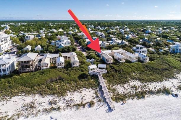Located south of 30A and just steps to the East Ruskin Pavilion, this two-story cottage offers an exceptional location with terrific gulf views. The interior of the cottage was remodeled to create two master suites and a third guest bedroom, each with private baths. On the second level generous windows from floor to ceiling in the living area fill the room with natural light and sunset views. The adjoining porch extends the living area to the outdoors and overlooks the emerald waters of the gulf and the quaint Seaside honeymoon cottages. The open kitchen has been updated with new cabinetry, stainless steel appliances, gas range and Vetrazzo (recycled sea glass) . countertops. Once master with king bed and en suite bath also on the second level with gulf view and access to the porch. Second master suite with king bed, en suite bath, morning kitchen and screened porch, third guest bedroom with private bath and (2) full size bunks on first level. The updated master baths include double sinks, Quartz counter tops and marble showers.  Option for guest bedroom to become a third master suite. Access to the beach from the screen porch is just a few steps away! Two private off street parking spaces provided. Furnished less some art.
**While information in this listing is believe to be true, buyer should verify all information and dimensions.