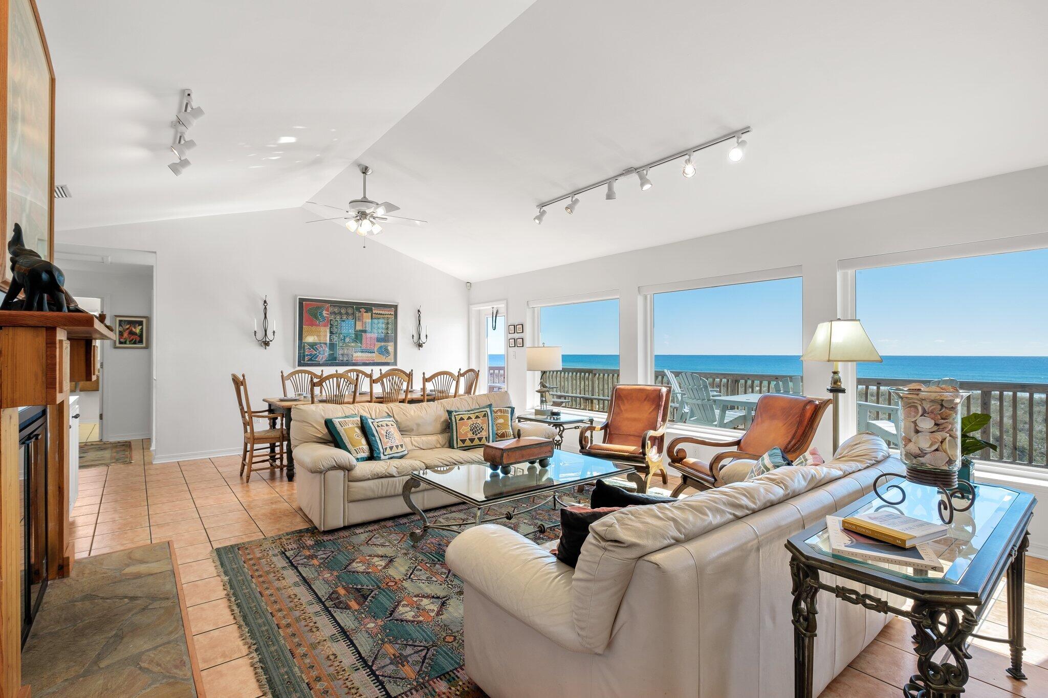 Enjoy beautiful Gulf Views from inside your home and only a few steps to the water's edge in this fabulous Beach Home on Navarre Beach.  There are 5 bedrooms, 3 baths, plus a second-floor bonus room. Well maintained and updated. Open living with fireplace, built ins, large kitchen with counter seating for 5+. Three bedrooms and two baths on one side and 2 bedrooms and 1 bath on the other side of the house. Beachside deck runs the complete length of the home adding loads of outdoor living  space to enjoy. Second floor has a large bonus room with built in shelving and bunks and access to a second outside deck. Home is sold furnished and turn key with a great rental history and reservations.  Makes a perfect second home/beach investment property. Seller requests all reservations be honored.