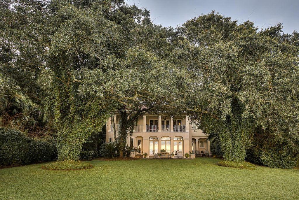 Price Reduced by $100,000 plus an additional $100,000 upgrade allowance. Want some real incentive and real potential future value? Get homesteaded this year, and with the $100,000 landscape, dock, paint and carpet budget, this place will be your dream come true in your personalized colors with trees that can't be duplicated. The best part is, it's 4 MILLION less than a house just a couple lots to the north in the same neighborhood.  Don't miss this opportunity from an empty nester who's moving on. This place is THE buy on 4-mile point.   Endless forever sunsets! Come now before its sets on this opportunity.   This Tuscan-style estate is priced to move with a panoramic view of the sunset across the Choctawhatchee Bay in Santa Rosa Beach, Beaches of South Walton. See More... After a quick walk around, this exquisite home and jaw dropping view will seem lifted off a poster. There are very few sunset lots like this one.   With several oaks over 100 years old and some over 200, this property will draw you in when you drive down the 300-foot winding, shaded driveway. This extremely private backyard features a unique topography that protects it during storms. A chef's kitchen and high-end trim and finishes make this home timeless with elegant touches of stone and wood. The entire width of the estate is framed by 3 large clusters of live oaks. The roof should last forever and never leak. There is a metal corrugated roof beneath the beautiful tile roof. The Pella Pro-Line hurricane windows throughout the home have been replaced regularly as needed. The oversized front door is solid mahogany. There are two fireplaces, one of which is in the master bedroom. The master bedroom suite has expansive windows and French doors that lead out to the upper balcony that faces the bay. The master bathroom has double sinks, a whirlpool tub and a walk-in shower. The gourmet kitchen boasts an over-sized granite island with a prep sink, granite counter tops, and abundant storage throughout with custom cherry cabinets. A Sub-Zero side-by-side wood paneled refrigerator is complimented by a 36" six burner Five Star range, two Five Star convection ovens, Fisher-Paykel dishwasher, and a flat screen television. The home has survived every storm since Opal with no water ever touching the house. It has a three-car, air-conditioned garage with a large workshop pre-plumbed that could serve as a cottage or mother-in-law quarters, plus it has a huge amount of storage overhead. Seller has been able to fit 4 cars in the garage, but with the workshop, it's really ideal for only three. Boat/jet ski lifts will remain, are in working condition, but are not warranted. This unique lot was platted in 1979, is not subject to dues, and is one of the few not in a HOA. Seller has a permit for 1,100 SF of dock from the Corp of Engineers in 1996. He believes you can replace the dock with a repair permit if you keep the same footprint. All of the pilings except one are still in place, but he removed the composite dock this past year when his neighbor's dock busted loose and destroyed his dock. Just a short drive with no traffic lights between shopping and Sacred Heart Hospital. Owner is currently in the process of moving out. NOTE: This property is subject to a 1031 tax deferred exchange for the benefit of the seller with no consequence to the buyer.