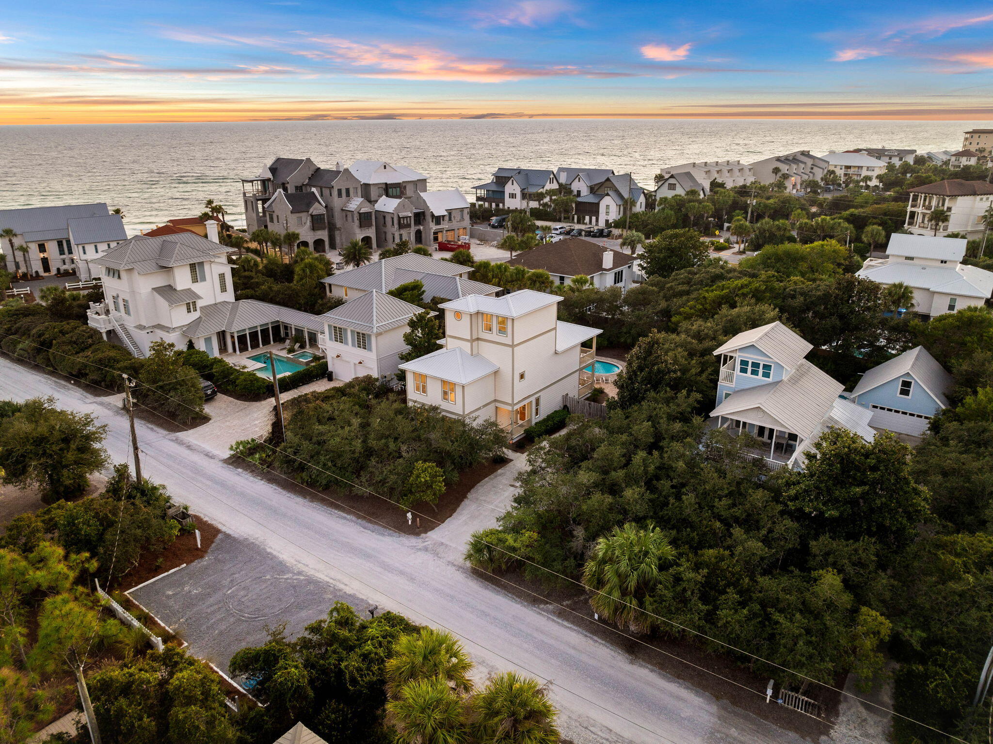A Blue Mountain Beach Escape. Situated just three homes off the Gulf of Mexico, this incredible property offers the perfect blend of coastal living and privacy. Located on a hard-to-find .25-acre lot (75x150) south of 30A, and with three DEEDED neighborhood beach access points steps away, you'll enjoy effortless access to the sugar-white sands and turquoise waters of Blue Mountain Beach, which sits at the highest elevation point along Florida's entire Gulf Coast at 65 feet.

As you step inside, the open living and dining areas welcome you with abundant natural light and a seamless connection to the kitchen. This spacious setup is perfect for family gatherings, with ample room for entertaining and easy access to the large covered patio, where you can enjoy views of the lush backyard and the heated swimming pool. Just beyond the living space, a first-floor bedroom offers flexibility for guests or family members.

On the second floor, the primary suite boasts a wrap-around balcony, ideal for taking in the Gulf breeze. Additional bedrooms on this level provide ample space for family and guests. The third-floor deck offers stunning Gulf views, perfect for watching the sunset after a day at the beach.

With Hardie board siding, a bunk room, and a large fenced backyard, this home is designed for laid-back coastal living. The proximity to local favorites like Blue Mountain Beach Bakery, Redfish Taco, The Creamery, and Cowgirl Kitchen makes this location unbeatable for those seeking both relaxation and convenience.

Come and discover why everyone loves living in Blue Mountain Beach. Whether it's for the unbeatable beach access, the peaceful elevation, or the vibrant local community, this home offers it all.
