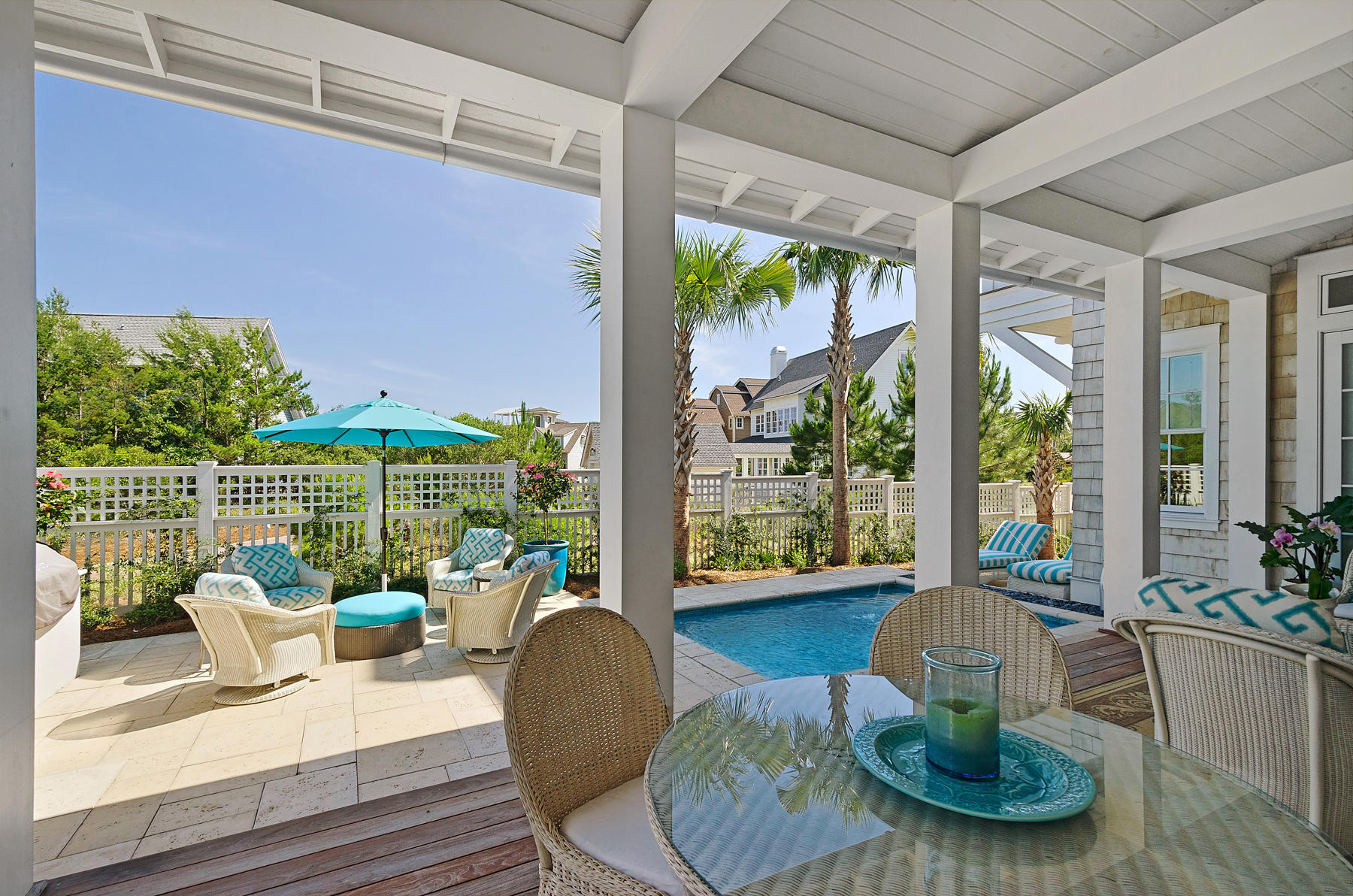 This beautiful home with outstanding amenities can be found in the exclusive Peninsula community of WaterSound Beach. Designed by renowned architect Geoff Chick and constructed by Envision Building Group, this high-end home has a host of notable extras. The heated 9x14 feet pool is surrounded by peacock pavers and there's a spacious IPE deck nearby with outdoor shower and summer kitchen. Modern technology includes an eco-friendly Ecobee smart thermostat and your own choice of music through the Sonos sound system. Covered and open decks along with a plethora of living spaces make this a fantastic home for relaxing and entertaining in style. 48 hour kick out clause in place. Red oak flooring adds natural warmth to the spacious living area which boasts a lofty cypress beamed ceiling, pristine white walls and stacked marble fireplace. Start the day with the aroma of freshly brewed coffee wafting through the home, courtesy of the built-in espresso coffee maker. Thermador appliances are discreetly housed in the Arctic white kitchen cabinets which include double-decker display cabinets. The oversized Carrera marble-topped island is ideal for casual dining or buffet-style entertaining. Wood-tread stairs lead to the upper floor which offers a second living area, four airy bedrooms and spa-like bathrooms featuring grey-veined marble and rain head showers. Transom-height windows maintain the clever use of natural light throughout the home. In addition, there's a detached carriage house over a two-car garage as well as ample parking for all your guests. Close to Camp Creek Lake and Deer Lake State Park you'll find hiking, biking, kayaking and nature spotting right our your doorstep. WaterSound Beach Club, community pools and the white sandy beach are a short golf cart ride away along meandering sidewalks and trails. Should you wish for more, Scenic Highway 30A provides easy access to local restaurants, shopping, cultural entertainment and Camp Creek Golf Club.