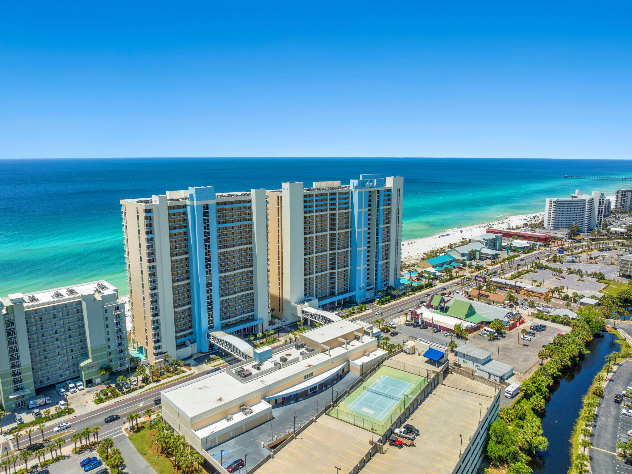 Gulf-Front Luxury with Endless Amenities: Experience the best of Panama City Beach from Majestic Beach Resort Unit 1906, a beautifully updated one-bedroom, two-bath condo with breathtaking Gulf views. Perched on the 19th floor, this coastal retreat is designed for up to four guests, offering the perfect blend of comfort and style. The private bedroom features a king bed, while a built-in bunk nook adds extra space for family or friends.

Step out onto the private balcony and take in sweeping views of the Gulf, perfect for enjoying outdoor dining as the sun sets. Inside, the open living space is filled with natural light, complemented by a fully equipped kitchen with full-size appliances and a dishwasher. Two bathrooms, an in-unit washer and dryer, high-speed Wi-Fi, and a Smart TV ensure every convenience is at your fingertips.

Majestic Beach Resort is packed with amenities, including five swimming pools, three hot tubs, and 650 feet of sugar-white sand beach with direct access. Guests also enjoy a fitness center, movie theater, tennis and pickleball courts, a game room, and multiple on-site dining options, from a Starbucks café to a seasonal poolside grill. Covered parking, lightning-fast elevators, and 24/7 security ensure a stress-free vacation home from start to finish.

Centrally located near Pier Park, Aaron Bessant Park, and some of the area's best restaurants and shopping, Majestic Beach Resort 1906 offers the ultimate combination of location, amenities, and Gulf-front living!