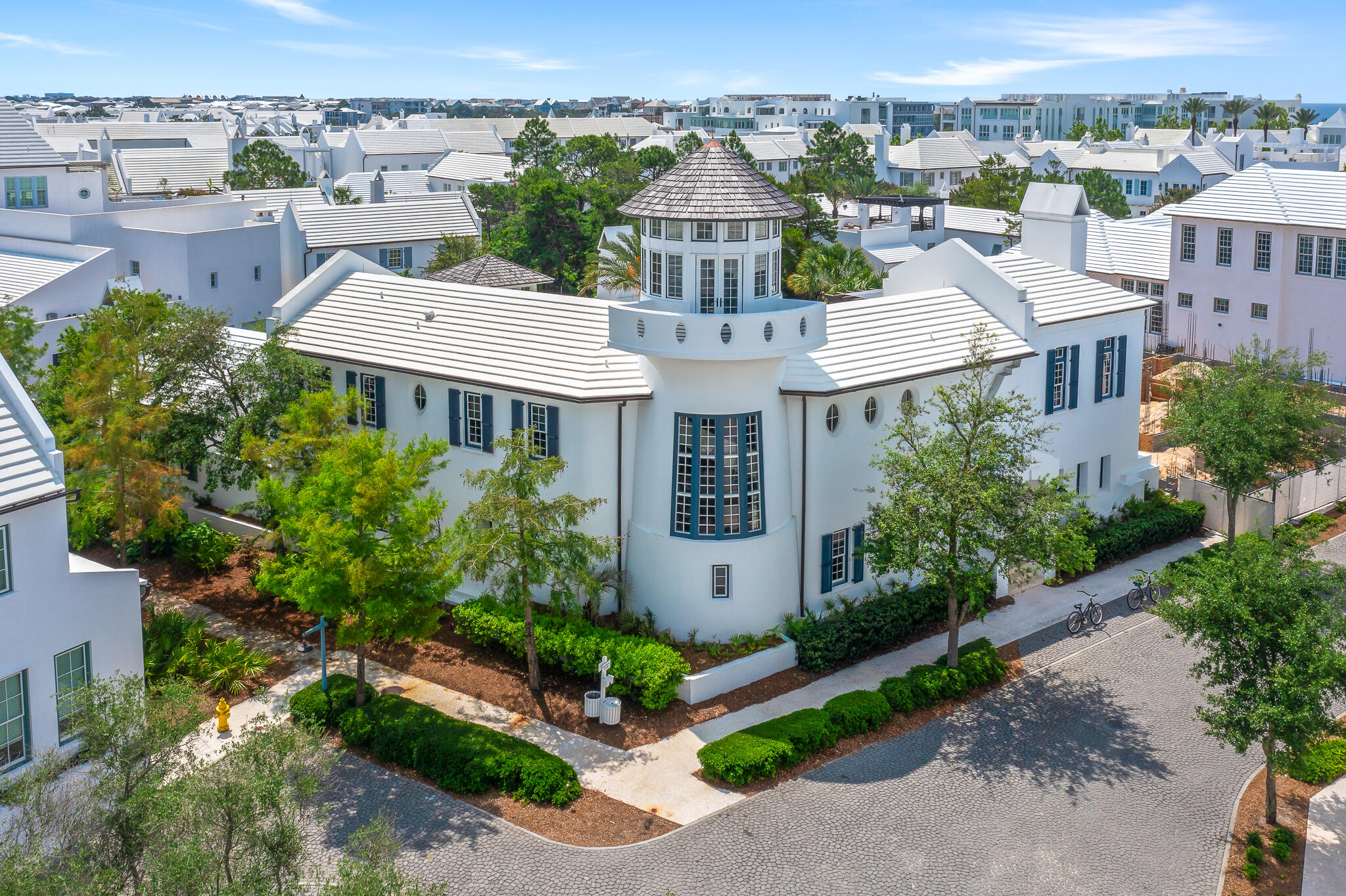 Entered for Comp Purposes. Introducing Aspri Villa, one of the largest Compound Houses in Alys Beah offering the largest pool and courtyard area in all of Alys Beach which exudes the feel of a private boutique hotel. Centrally located on North Charles Street overlooking Papilio Park, this house defines the streetscape with a 3rd floor Tower Room that provides horizon views over the whitewashed rooftops throughout the town. 

This stunning Tom Christ design boasts 6 bedrooms and 7.5 bathrooms, providing ample space for both relaxation and entertainment. The expansive first floor has a master suite, multiple living rooms that look out to the covered loggia and courtyard beyond, a pool house with 2 guest suite bedrooms, a professionally outfitted kitchen with Calcutta gold marble and beamed ceilings, a private breakfast courtyard off the kitchen, and a large 2 car garage. The dramatic spiraled staircase leads to the private master bedroom suite which spans the entire southern wing of the second floor while the eastern wing is comprised of 2 guest suite bedrooms and a trellised rooftop terrace. An additional and separate rooftop terrace offers an outdoor dining area, fire place and hot tub.Very rare opportunity to own this one-of-a-kind property in Alys Beach.