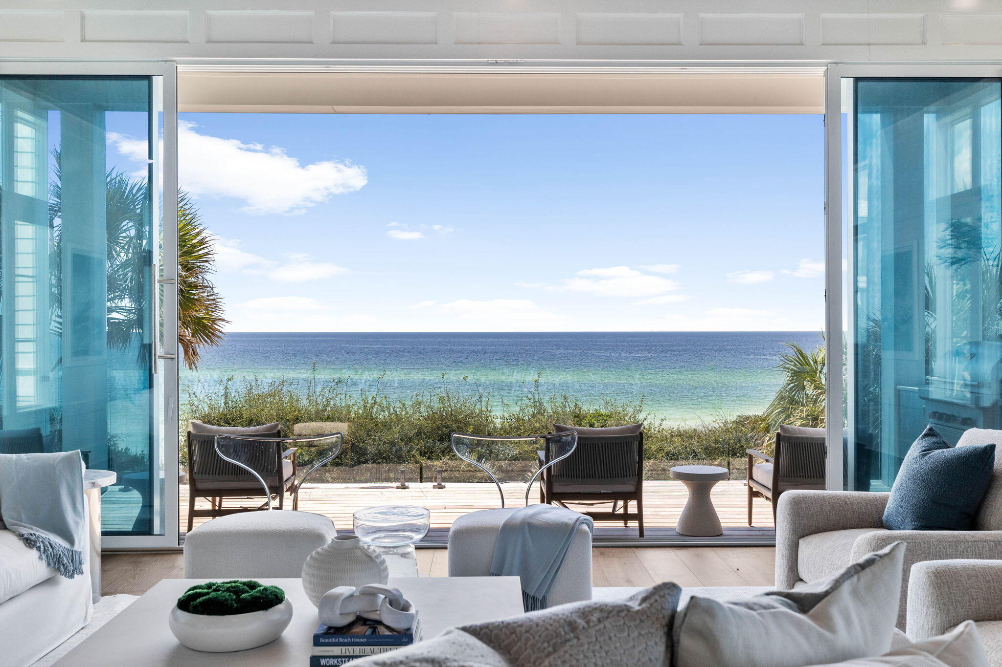 Welcome to 'The Landing' at 28 Bramble Grove Place - a legacy Gulf-front estate where family memories will be cherished for generations. Located along the iconic 30A coastline in Seagrove Beach, this stunning residence offers over 8,800 square feet of thoughtfully designed luxury living, with panoramic Gulf views and breathtaking sunsets.

Spanning four levels, The Landing features a custom chef's kitchen equipped with Wolf/SubZero appliances, a striking waterfall-edge island, and a butler's pantry leading to an additional wine room. The open floor plan seamlessly extends through Euro Wall sliding doors to expansive outdoor spaces, including a private pool with peacock paver decking - perfect for entertaining or simply unwinding in the Florida sun. The primary suite is a private retreat, offering a beachfront balcony, study, sitting area, walk-in closet, and a wet bar, ideal for enjoying morning coffee with stunning Gulf views. With 8 bedrooms and 8 bathrooms, this estate provides luxurious accommodations for family and guests alike.

The Landing offers an array of premium amenities, including a theater room, yoga/pilates room, home gym, and an elevator servicing all four floors. The home's private beach walkover offers direct access to the Gulf, and the rooftop terrace provides an incredible vantage point for viewing sunsets over the water.

This meticulously crafted home presents a rare opportunity to own a premier Gulf-front estate on 30A, designed to create lasting family memories for generations to come.