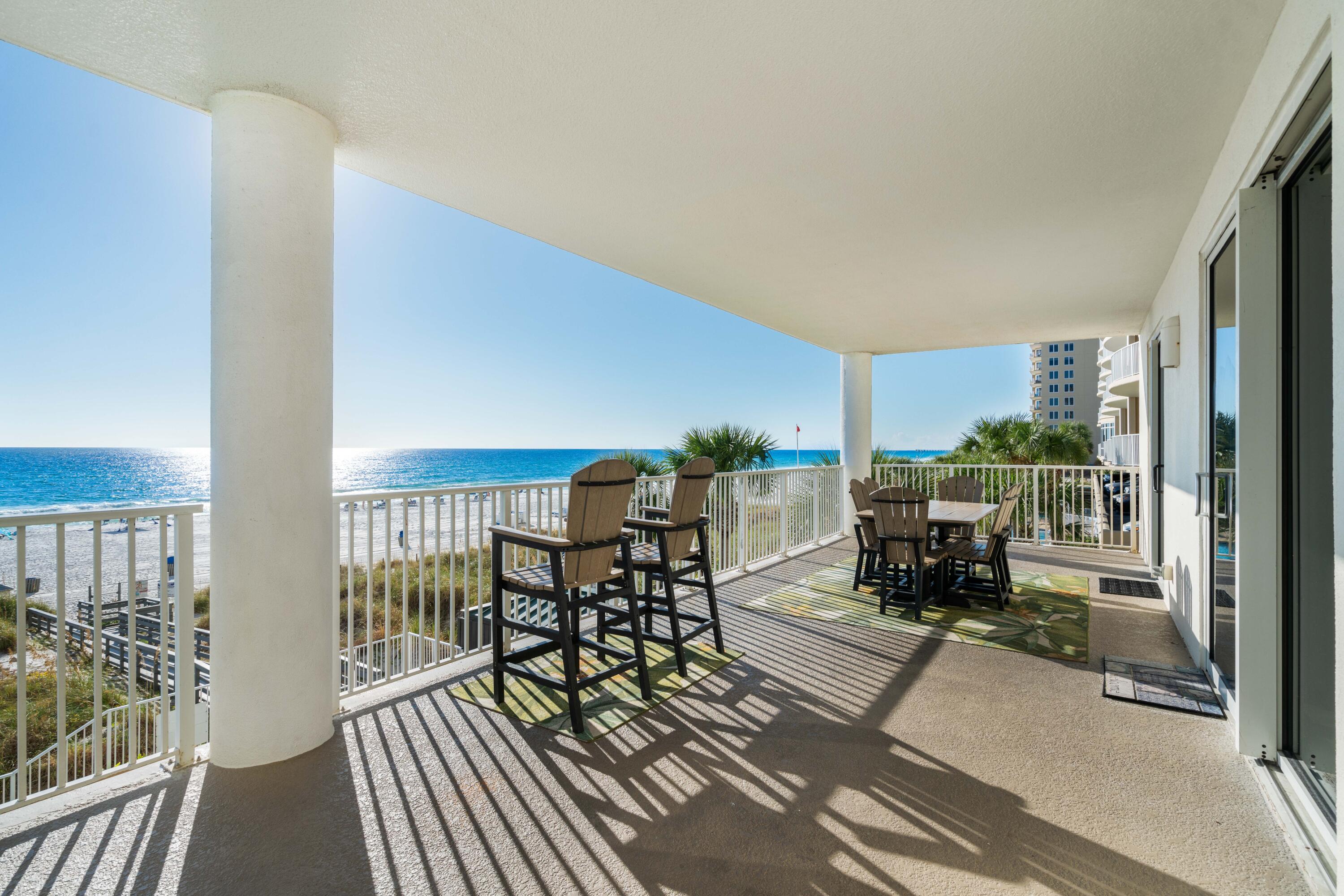 Amazing Gulf views with unobstructed sunrises and sunsets from the oversized balcony of this COMPLETELY UPDATED and well maintained 3rd floor 4 bedroom/4 bath condo in Ocean Ritz!  With $104k in rentals for 2023 and $88k in 2024, this unit has proven historical income that you can depend on from day one!  This unit features TWO Gulf Front Master bedrooms, both leading out to the huge 500 sq ft covered balcony!  Modern coastal finishes throughout make this unit truly turnkey.  Nothing went untouched!  The unit also has a deeded/assigned garage parking space.  Ocean Ritz is a low density building just minutes from Pier Park and a short drive to Scenic 30a, this unit would make a great second home or rental property that the family can enjoy while generating strong income to offset expenses!