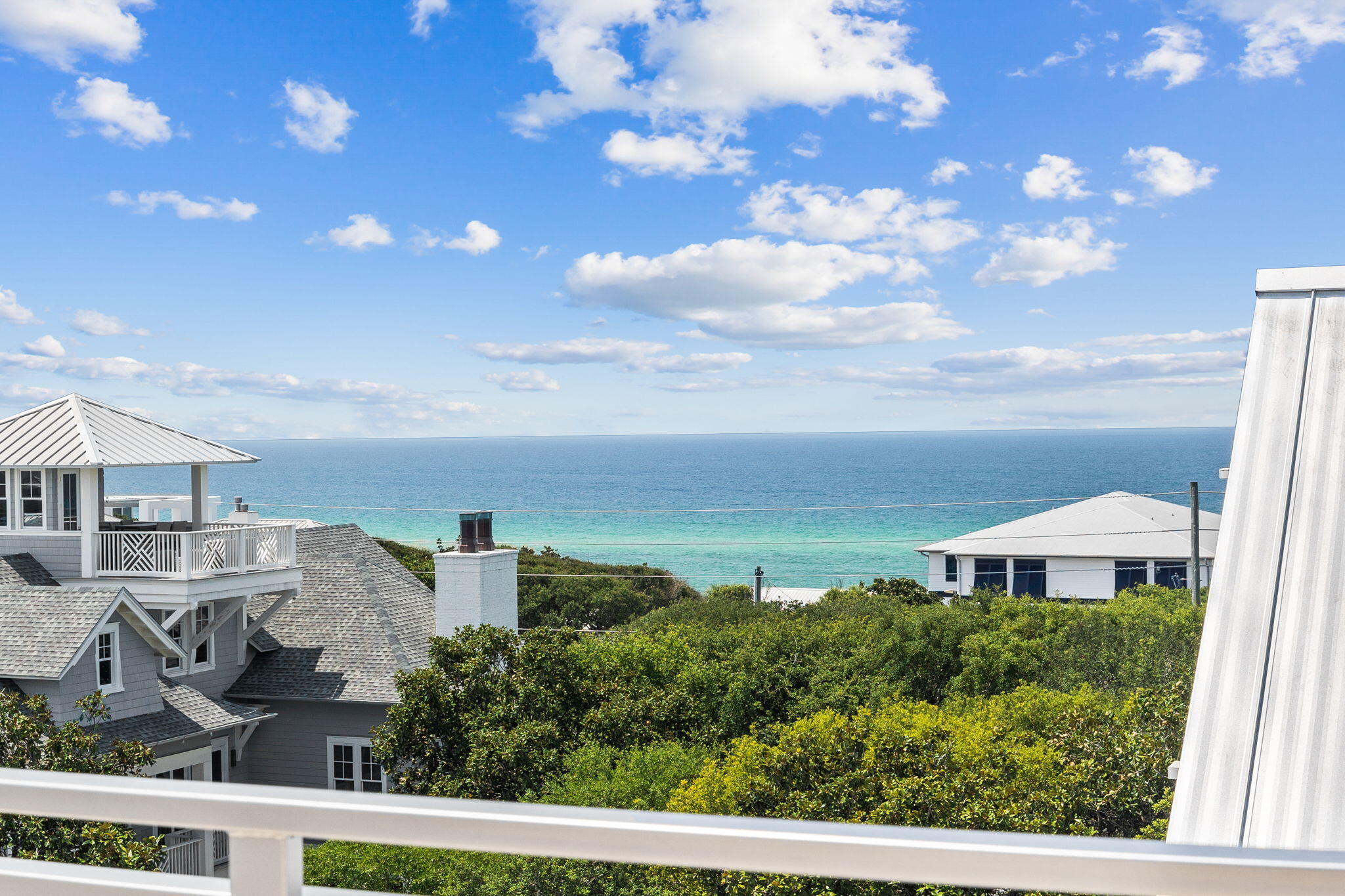 Welcome to 57 Azalea, where timeless elegance meets the serenity of coastal living. Nestled along the picturesque shores of 30A just three tiers off the white sand beaches of the Gulf of Mexico, this exquisite residence beckons you to immerse yourself in its luxurious charm and unmatched beauty. Notable features include $400,000+ in projected gross annual rental income, 8 full bedrooms as well as a ninth bunk room space, 1200+ sqft rooftop deck with panoramic views of the gulf.

As a masterful testament to architectural brilliance, 57 Azalea seamlessly blends modern sophistication with the natural allure of the Gulf Coast. This stunning abode boasts eight bedrooms and 8.5 bathrooms, offering an abundance of space and comfort for the discerning homeowner seeking the ultimate retreat.
