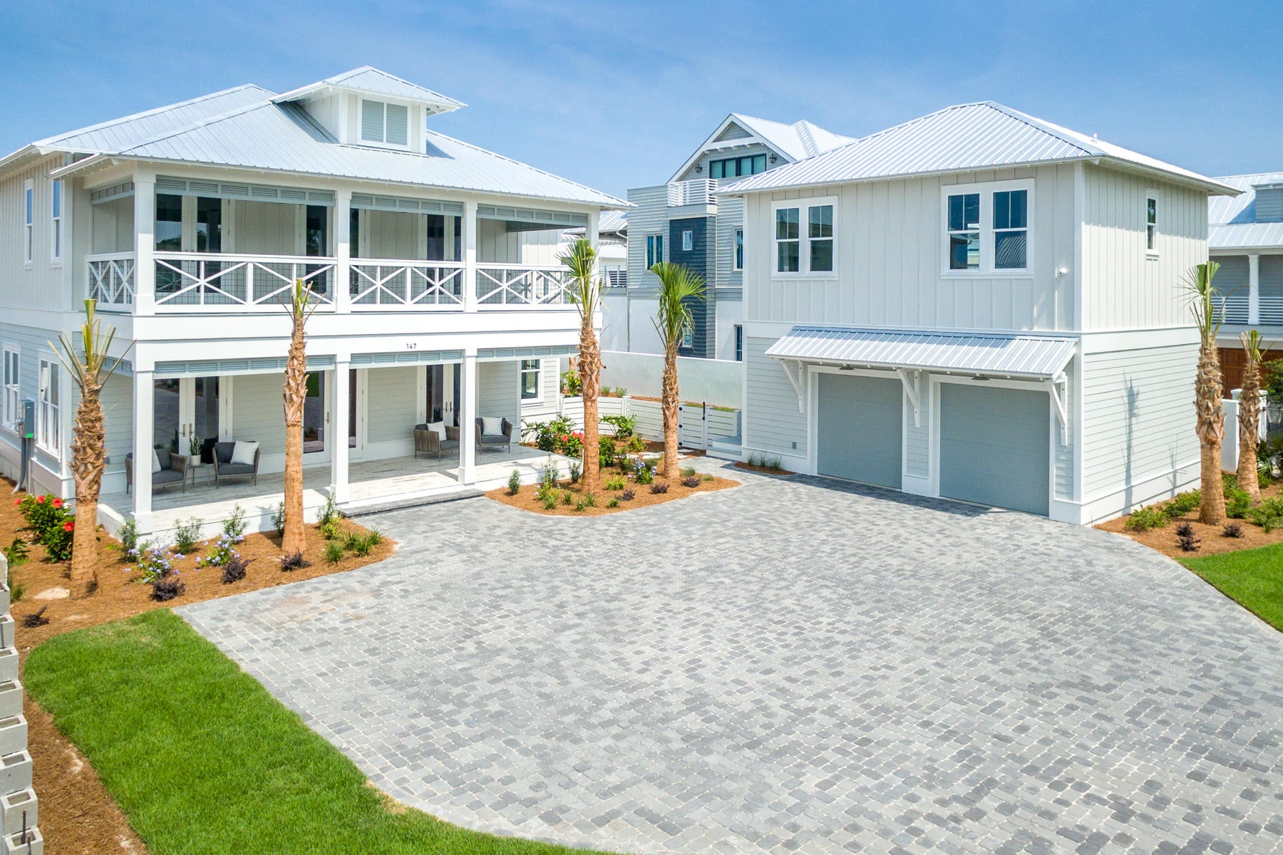 This beautiful, new construction 6 bedroom, 6.5 bath custom built home by Cogent Builders offers 4668 SF, a large private pool, 1,100 SF of porches, 2 car garage with carriage house and deeded beach access. The property is scheduled to be complete the end of May and will be fully furnished by K & J Design Group. The spectacular open concept living and dining room are filled with natural light, open onto a large porch and anchored by a gourmet kitchen with custom solid wood cabinetry, quartz countertops, a 48'' Thermador refrigerator, 6 burner range top with griddle, double oven, 2 dishwashers and an oversized pantry. The screened in porch with summer kitchen overlooks the private pool and amazing backyard oasis. The spacious first floor master suite has a stunning ''spa like'' master.. -bath with a large walk-in closet. The second floor offers a junior master suite with a beautifully appointed bathroom, two additional bedrooms and a bunkroom, each with lovely ensuite baths. All bathrooms are finished Quartz countertops and designer selected custom tile. This home also offers a private carriage house retreat with kitchenette overlooking the pool, beautiful hardwood floors throughout the living areas and bedrooms, designer selected light fixtures, solid core doors, 3 tankless hot water heaters, hurricane rated doors and windows and is situated on a quiet cul-de-sac with deeded beach access and a bike ride to the shops and restaurants of Alys and Rosemary Beach! This home would make a great primary home or rental investment with rental projections of $150K+.