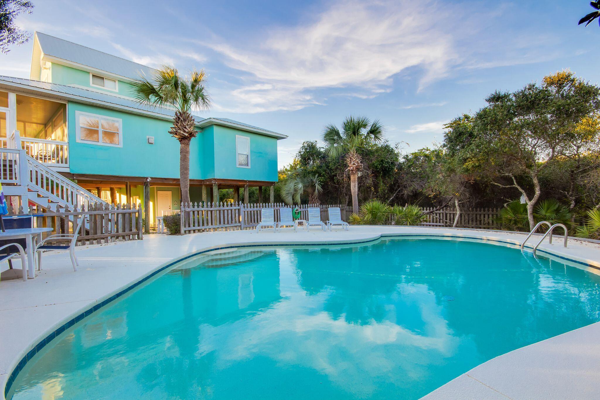 30A Original Owner!! Blue Mountain Beach. Home is sold completely Furnished! 
Vacation Rental ready earning $147K per year. Among many other benefits, you can enjoy a view of the Gulf from the second-floor patio deck, a fantastic Gulf view from the third-level private balcony, and a very short walk, just 315 feet to the beach. Features a screened covered porch and an open sun deck off of the living area. The master suite upstairs offers another beautiful open sun deck with gorgeous views of the gulf and sunsets. The 28' x 22' pool is very private with a poolside ½ bath.  1st Floor:
" Half Bathroom

2nd Floor:
" Master Bedroom #1: Queen Bed, Private Bath with Custom Murals, Shower-Tub Combo
" Guest Bedroom #1: Twin Over Twin Bunk Bed (limit of 100 pounds), Full Bed, Jack and Jill Bath
" Guest Bedroom #2: Queen Bed, Jack and Jill Bath

3rd Floor:
" Master Bedroom #2: King Bed, Master Bathroom, Private Balcony, Gulf Views

PROPERTY HIGHLIGHTS:
" Beach Access: Only 315 Feet From Beach Access
" Washer/Dryer
" 28' x 22' Private Pool
" Gas Grill
" Tile Flooring
" Screened-In Porch
" Hot/Cold Outdoor Shower
" Parking For 6 Cars