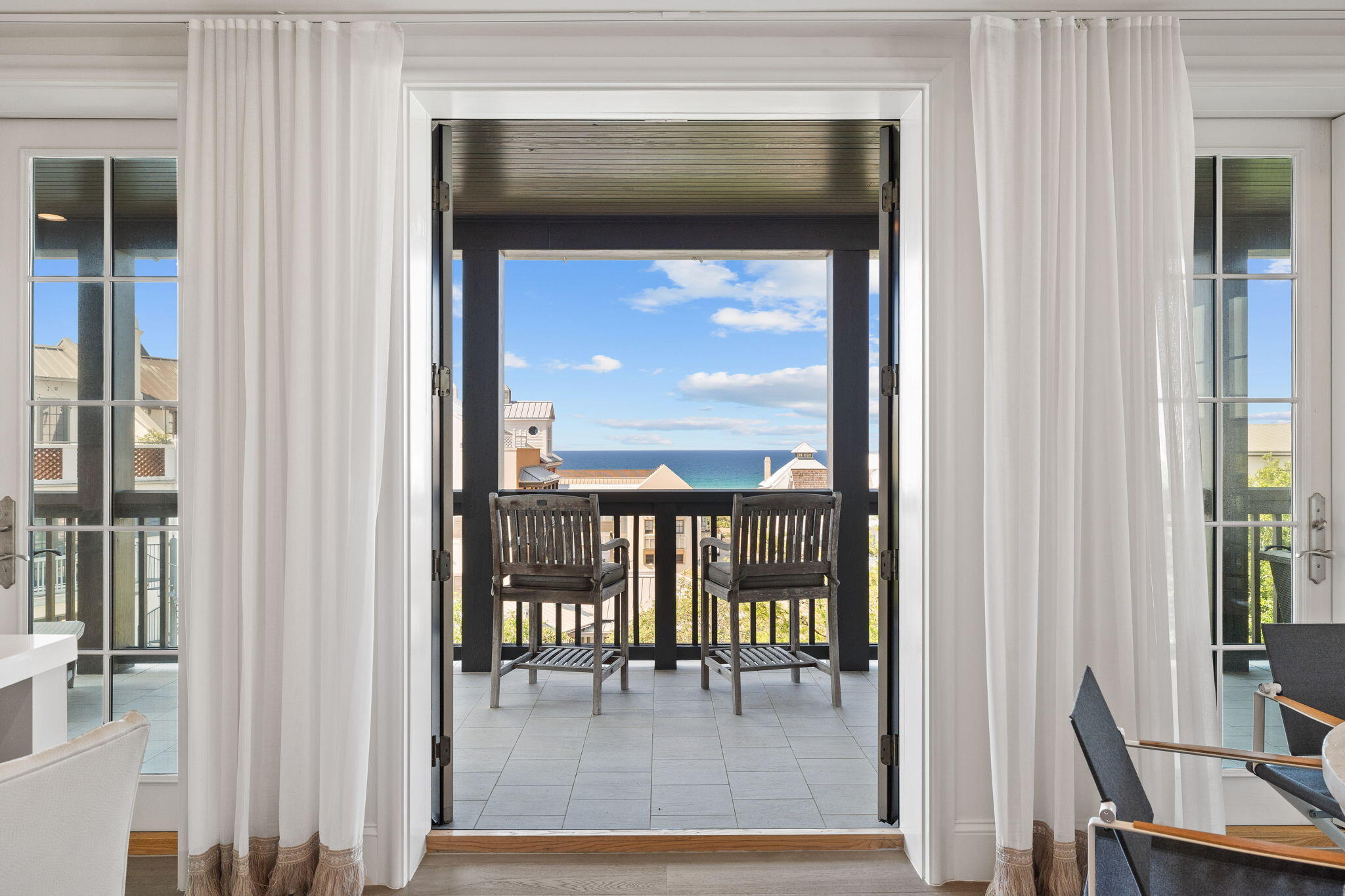 Prominently positioned south of 30A in the esteemed Orleans condominium, the latest addition to Rosemary Beach's famed architectural lineup, which houses the famous Piano Bar and incredible Pescado rooftop bar and restaurant. Unit 3C is an exquisite condo offering an unparalleled living experience, combining luxurious comfort with breathtaking Gulf views. Step inside this single-floor haven to find an open and inviting layout. The spacious living room, adorned with elegant finishes and abundant natural light, serves as the perfect backdrop for relaxation and entertainment. Large windows frame stunning vistas of the Gulf, creating a serene ambiance that soothes the soul.