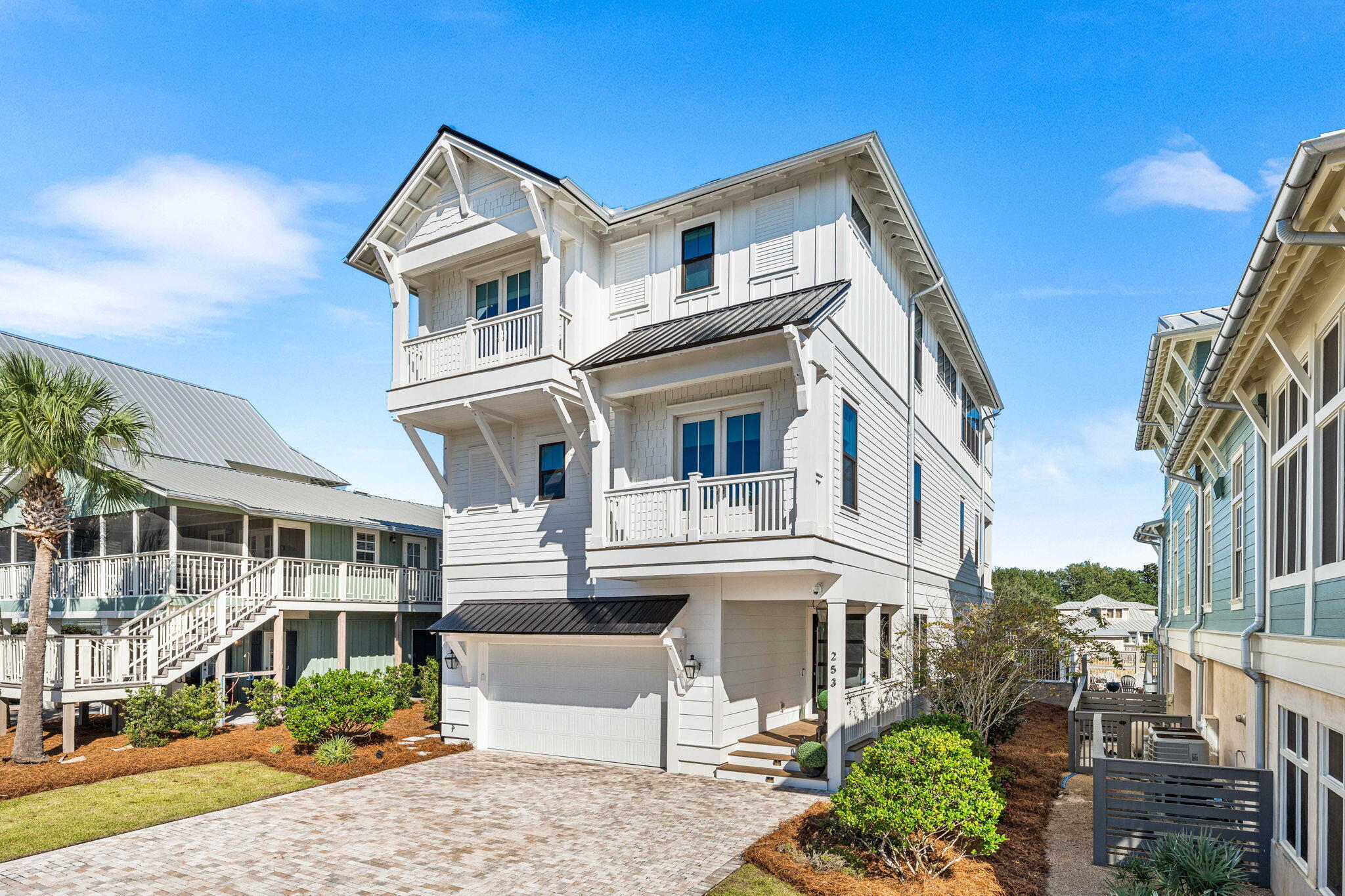 *Luxury on the Coast* Experience the ultimate in coastal living with this stunning 5-bedroom, 5.5-bath, 4,385 sq. ft. home featuring professionally designed luxury interiors. Thoughtfully planned across three levels, this residence offers an elevator for easy access to all floors, including the 3rd-level main living area and chef's kitchen equipped with expansive island, Viking and Sub-Zero appliances, double ovens, two dishwashers, a warming drawer, oversized wine refrigerator, and stand-alone ice maker.  Engineered hardwood flooring flows throughout, complemented by beverage stations on every floor and marble-finished baths that exude spa-like sophistication.  Enjoy over 2,300 sq. ft. of outdoor living space, including summer kitchens on the first and third level porches ideal for entertaining and taking in the coastal breeze.  Start or end your day with a sunrise or a sunset on your private rooftop retreat with sweeping gulf and Grayton Beach dune views.