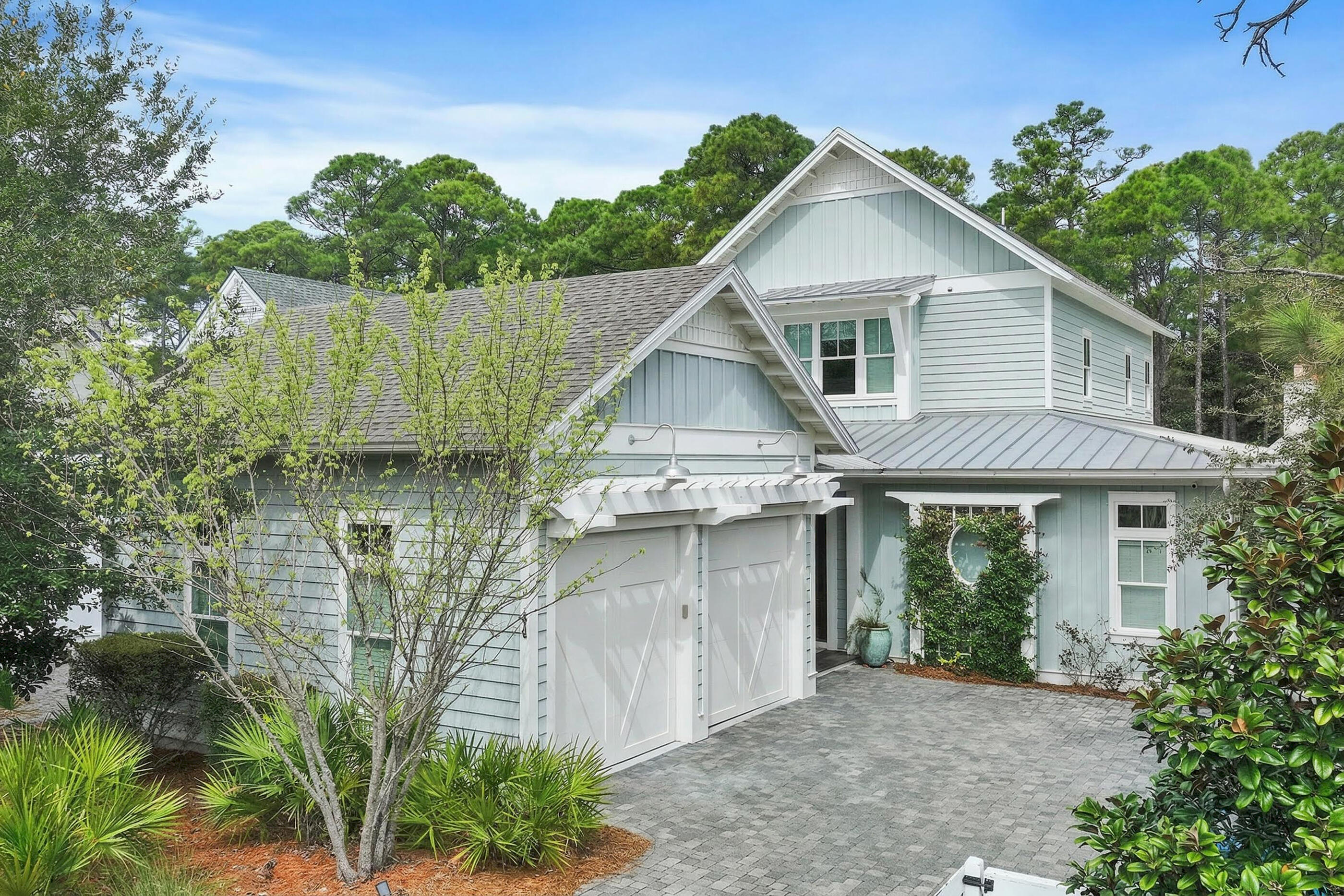 Welcome to 44 Sextant Lane in Watersound West Beach, a thoughtfully designed coastal residence overlooking a serene wooded preserve. This spacious home features wood flooring throughout, Thermador appliances, and a large walk-in pantry & spacious laundry room that enhances both functionality and style. The open living areas extend to a large screened porch complete with a gas fireplace and built-in grill, ideal for outdoor enjoyment year-round.
The floor plan offers two primary suites (one on the main level), guest suite, upstairs secondary living area, and two sets of custom built-in bunk spaces providing flexible sleeping and gathering options. Additional highlights include a second-level balcony with sun deck, a two-car garage, and generous storage throughout This Regal Stephens built "Sandcastle Plan" features a incredible first floor primary suite (bedroom is 21 x 19) with spacious walk-in closet and french doors leading to the lovely screened porch overlooking the private preserve--no rear neighbors!  The ensuite bath provides luxury with a oversized shower, freestanding tub, double vanities, water closet, and designer lighting.

Watersound West Beach is known for its private BEACH ACCESS via a scenic boardwalk through Deer Lake State Park, along with resort-style amenities including a heated/cooled community pool, parks, walking trails, putting green, fitness center, bike parking at beach, and security-gated entrance. This home is just a short stroll or bike ride to the beach, making it a true 30A coastal lifestyle opportunity. The BEACH ACCESS is a private perpetual easement so no crowds and no Customary Use worries! Whether you're searching for a primary residence, second home, or investment property, this home, offered beautifully furnished and appointed, delivers space, style, and location in one of 30A's most desirable communities. Call today for a private showing.