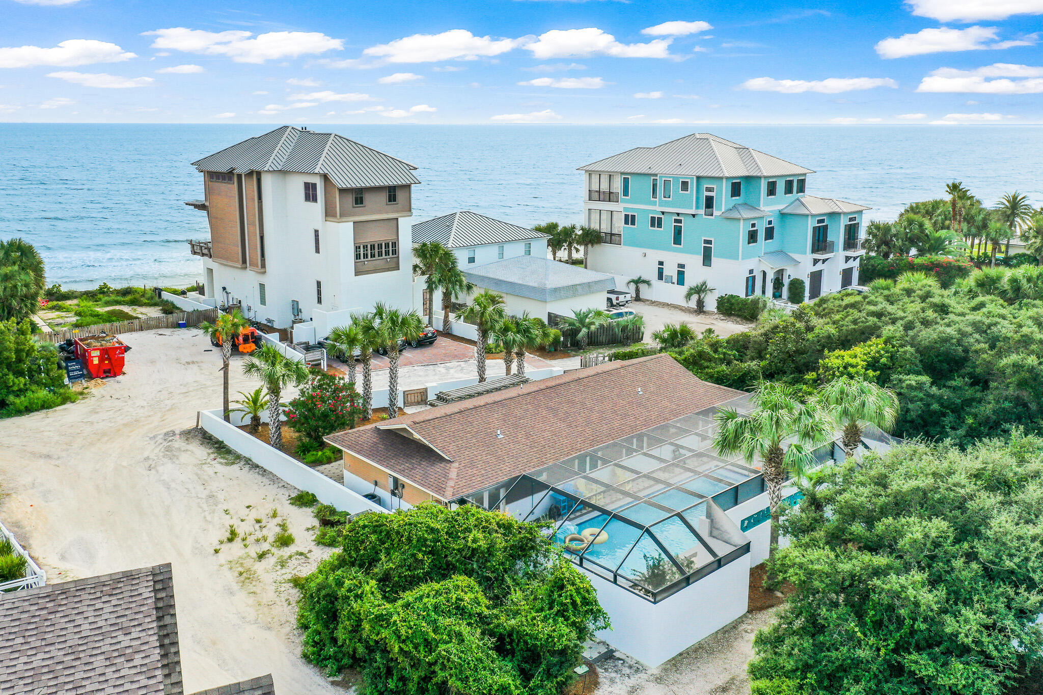 Inviting 4-bedroom home ideally located on the eastern side of Highway 30A. Steps away from the beautiful white sands of Inlet Beach and emerald waters of the Gulf of Mexico.  Spacious floor plan incorporates two completely separate living areas. Both compiled with full kitchens, living room spaces, bathroom and washer/dryer units. The vaulted ceilings combined with the custom wood paneling and ambient lighting throughout give the home a warm and comfortable vibe. Both master bedrooms are overlooking the private pool area.  Two additional bedrooms have custom bunk beds for added sleeping space.  The ideal 30A locale offers an amazing proximity to the beach, trails, shops & restaurants in the nearby communities of Seacrest, Paradise by the Sea, and Rosemary Beach.