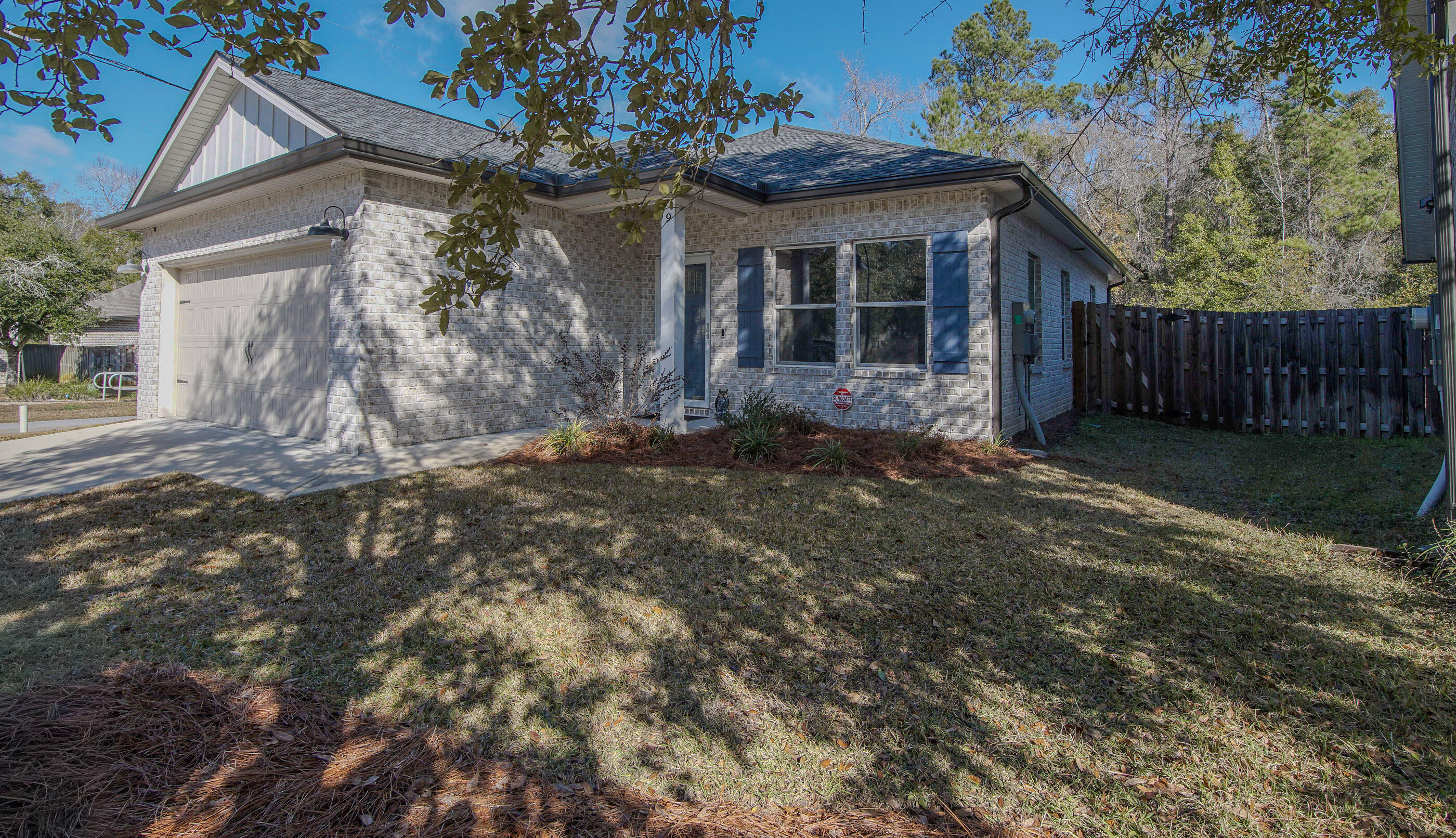 Turn-key, thoughtfully upgraded, and exceptionally well maintained, this all-brick Craftsman-style home offers easy single-level living in a quiet Laurel Oaks subdivision. Originally purchased as new construction on July 26, 2023, the home has been lightly used as a seasonal residence and enhanced with numerous functional upgrades since purchase.

The open-concept floor plan flows through the great room, kitchen, and dining area, featuring raised ceilings, recessed lighting, and luxury vinyl plank flooring in the main living spaces, with carpeted bedrooms for added comfort. The kitchen offers white shaker-style cabinetry, quartz countertops, stainless steel appliances, pantry storage, and bar seating. Several cabinets have been upgraded with slide-out shelving for improved accessibility and organization, and the kitchen is conveyed fully equipped.

The primary suite includes a walk-in closet, double vanities, and a tiled walk-in shower, while the guest bathroom features a tub/shower combination. Comfort-height toilets have been installed throughout the home, all closets include lighting, and the laundry room has added shelving. Washer and dryer convey.

Since purchase, in the attached garage the ceiling has been fully insulated to match the rest of the home, including an insulated garage door, and includes a water shut-off. Additional upgrades include, gutters, a screened rear porch, Ring doorbell, alarm system, remote thermostat, window treatments/blinds, garbage disposal, and irrigation system with a separate well. The home sits on a corner lot with a privacy-fenced backyard and is surrounded by similarly maintained homes within the subdivision.

Offered fully furnished, with furnishings purchased new in 2023, including televisions, linens, and a fully stocked kitchen, this home is truly move-in ready and ideal for a snowbird or second-home buyer seeking a low-maintenance, turnkey property. Located in Flood Zone X.

Conveniently located south of Hwy 20 near Hwy 331, Laurel Oaks provides easy access to Freeport conveniences while remaining a comfortable drive to coastal destinations.