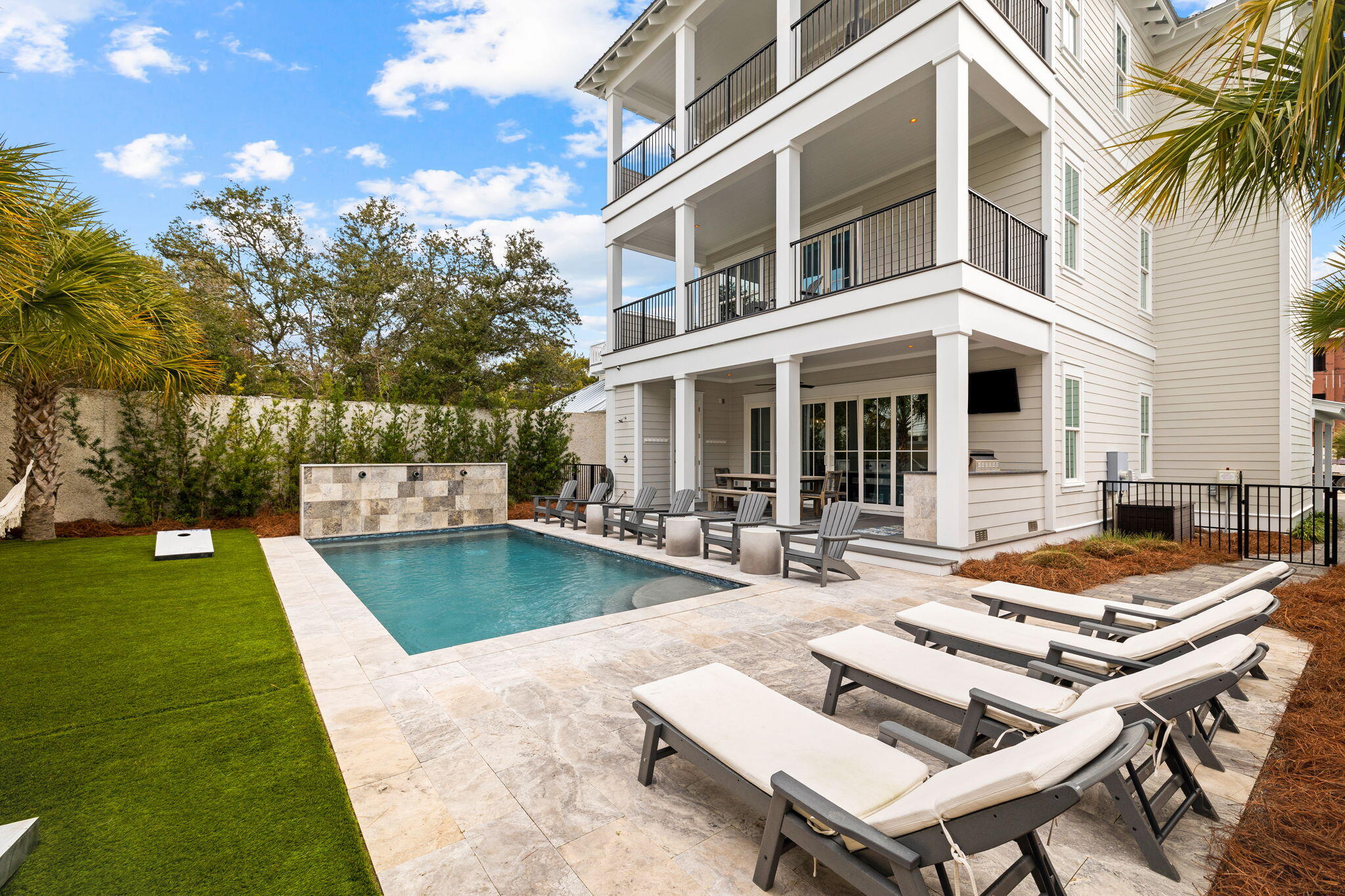 Immerse yourself in the epitome of coastal elegance at this newly constructed sanctuary nestled in Seagrove Beach, strategically located less than a mile from Seaside and the vibrant dining, shopping, and entertainment scene along 30A. Beyond its proximity to the Santa Clara public beach, the property boasts DEEDED BEACH ACCESS, ensuring swift access to the sun-kissed sands.

Designed with a focus on maximizing Gulf views from both east and west, this remarkable open floor plan features 5 bedrooms, 5 full baths, and 3 half baths, complemented by inviting living and gathering spaces. The outdoor oasis is equally captivating, featuring an extra-large heated pool and captivating outdoor entertainment areas, including an elevated top 3rd-floor entertainment area both indoors and outdoors.