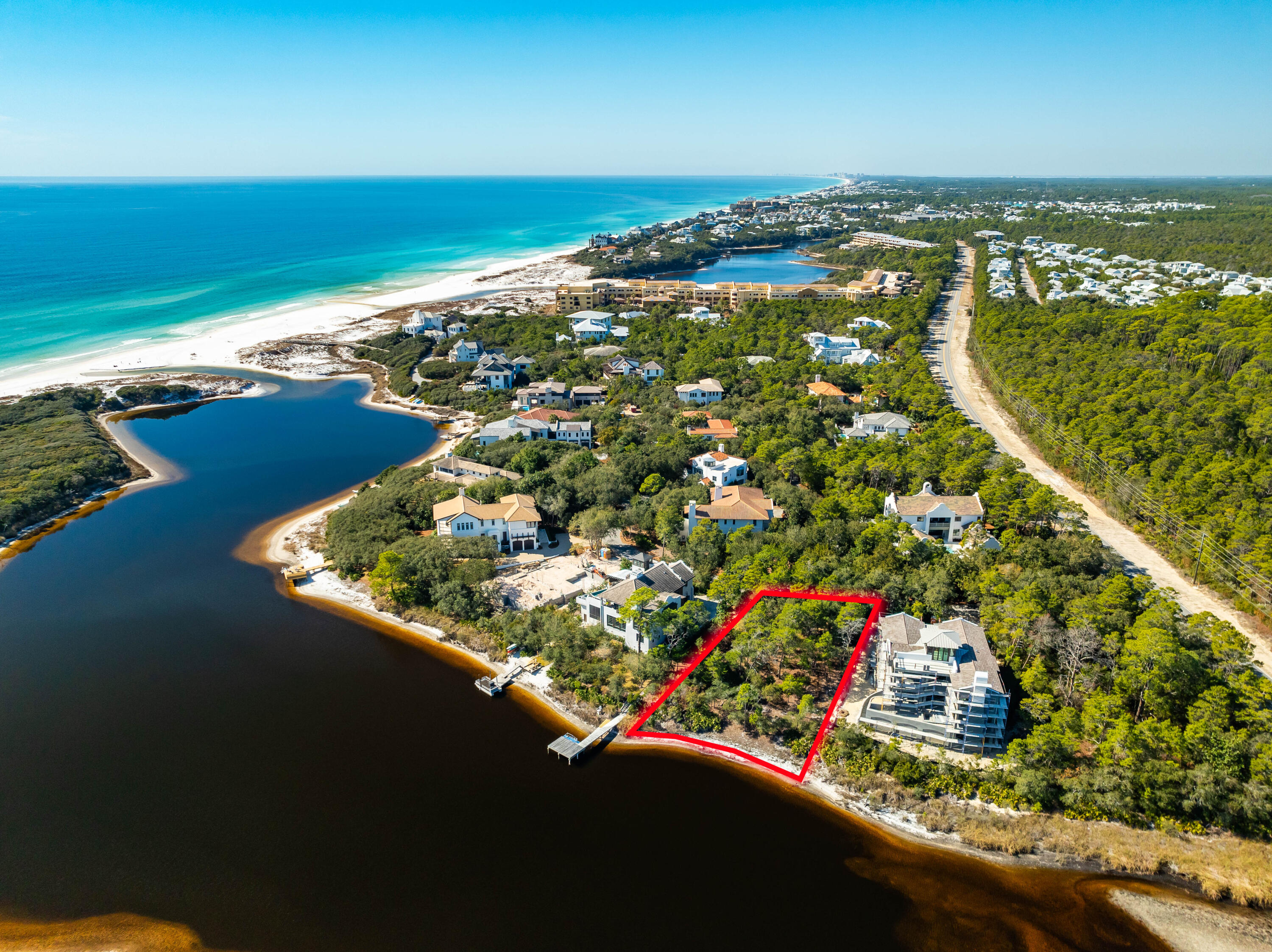Rare dune lake lot with stunning lake and gulf views .Discover a once-in-a- lifetime opportunity to own a premier homesite in the prestigious, gated enclave of Redfish Lane, home to just 18 exclusive residences. This exceptional lot boasts unparalleled views of Little Redfish Lake and the Gulf of Mexico, offering a serene and breathtaking backdrop for your custom luxury home.  

Nestled between the pristine white sands of the Gulf to the south, and the tranquil waters of Little Redfish Lake and Grayton Beach State Park to the east, this location offers both seclusion and natural beauty. Outdoor enthusiasts will love the hundreds of acres of preserved land to the north, perfect for exploring nature trails, kayaking, and birdwatching. Design and build your dream home with expansive lake and gulf views, surrounded by the beauty of one of the most sought-after coastal communities on the west end of 30A. Don't miss this rare opportunity to own a piece of paradise!