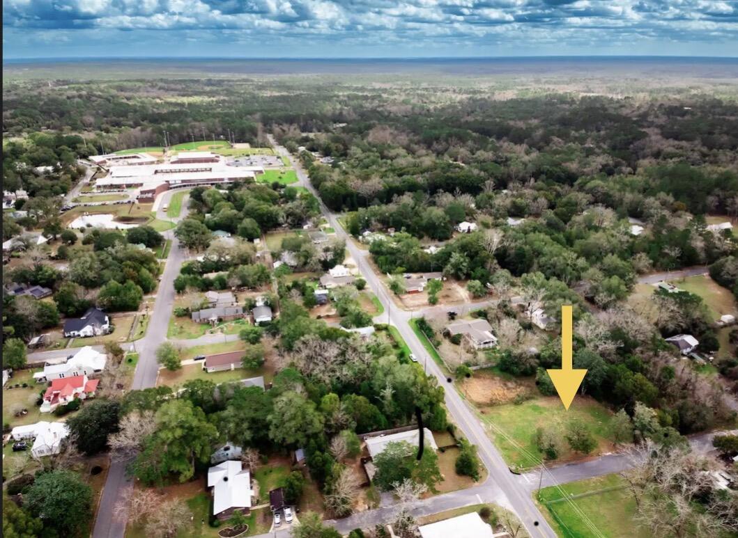 Build-ready opportunity in DeFuniak Springs consisting of two adjoining parcels sold together, totaling approximately 0.26 acres. The lot has been cleared and is ready for development. Features frontage on Bruce Avenue, with a boundary survey on file showing the combined parcel configuration. Conveniently located just minutes from downtown DeFuniak Springs, shopping, schools, and local amenities, while still offering an easy commute to the beautiful Emerald Coast beaches. Whether planning a custom home, investment build, or holding for future appreciation, this site offers multiple possibilities. 
Buyer to verify all measurements, zoning, and development requirements