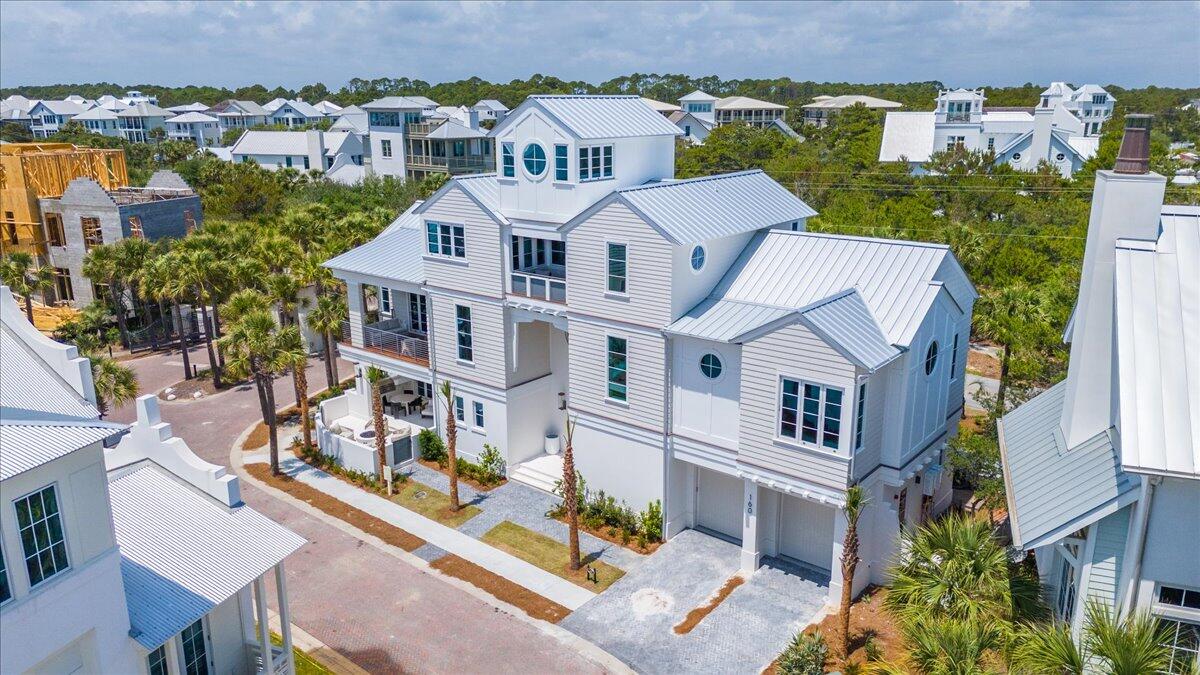 Construction is now complete on this remarkable new home in the non-rental, Gulf-front community of Heritage Dunes South, located off Eastern Lake Road in the heart of Seagrove Beach.

Built by Coastal Custom Builders and designed with curated finishes by CCArt & Design Co., this 5,396-square-foot residence offers 5 bedrooms, 5 full bathrooms, and 2 half baths, blending timeless coastal design with high-end craftsmanship.

The open-concept layout features generous living and dining areas, a gourmet kitchen outfitted with premium appliances and custom details, and an elevator for effortless access across all levels. 

A four-story tower captures sweeping Gulf views, creating a one-of-a-kind vantage point for sunrise and sunset. Enjoy a seamless indoor-outdoor lifestyle with multiple balconies, an outdoor kitchen, and thoughtful exterior living spaces designed to make the most of the coastal setting. A two-car garage adds convenience, while quality finishes throughout elevate the home's overall feel.

Heritage Dunes South is a non-rental, gated community featuring a deeded private beach and a community pool, just steps from your front door. 

This home is now ready for move-inbringing together location, design, and lifestyle in one incredible Seagrove Beach opportunity.
