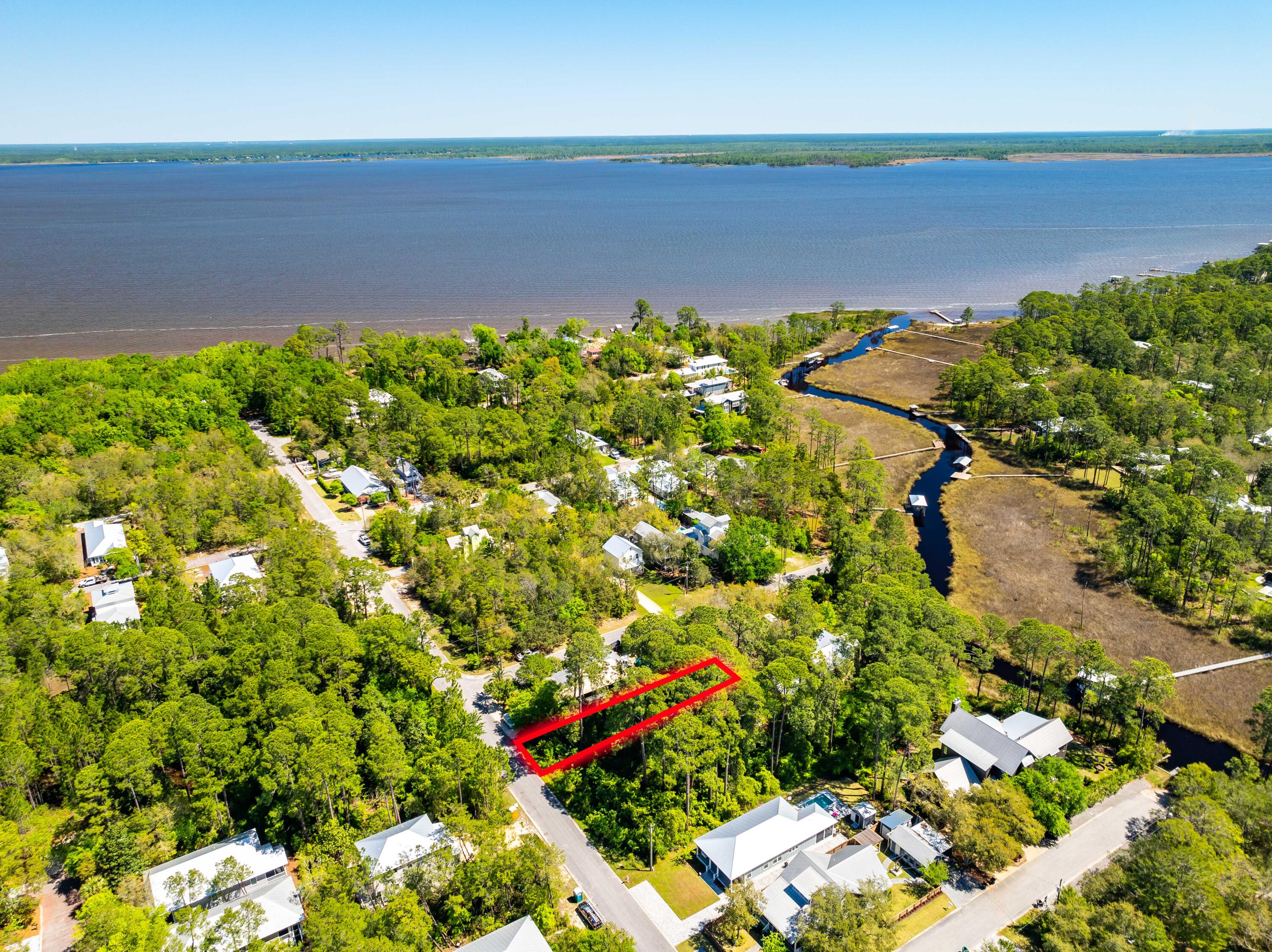 A remarkable opportunity awaits in the beautiful Pt Washington locale. Nestled in great development and conveniently located just 1/10 of a mile from the neighborhood boat ramp. Plus, enjoy easy access to a bay front county park featuring a kayak launch, only a few blocks away. With no HOA fees and no build-out deadlines, seize the chance to make your dream home a reality. This is a great opportunity to be just a few miles from Grayton Beach and Seaside giving you the chance to enjoy the best of the Emerald Coast.