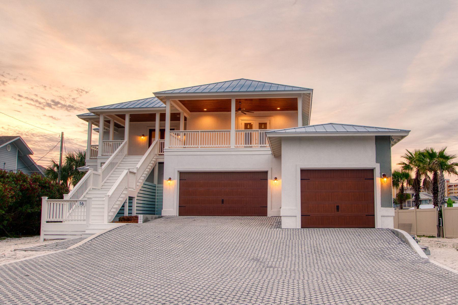 Boater's dream home with 70' of water frontage on the Destin harbor, 690sf of wraparound porches and balconies, and 4 boat slips with room to accommodate an exceptionally large boat. Enjoy captivating sunrise and sunset Destin Harbor views from all floors of this impressive new waterfront retreat on one of the largest waterfront lots in Holiday Isle, strategically positioned to allow for a future harbor front pool. Recently completed with furnishing package available for purchase separately. The spacious kitchen and living area overlook the harbor with 180-degree water views. Each floor boasts a spacious waterfront master suite. 4 additional bedrooms, an office, a powder bath, and a gourmet kitchen with large center island and walk-in butler's pantry complete this waterfront paradise.