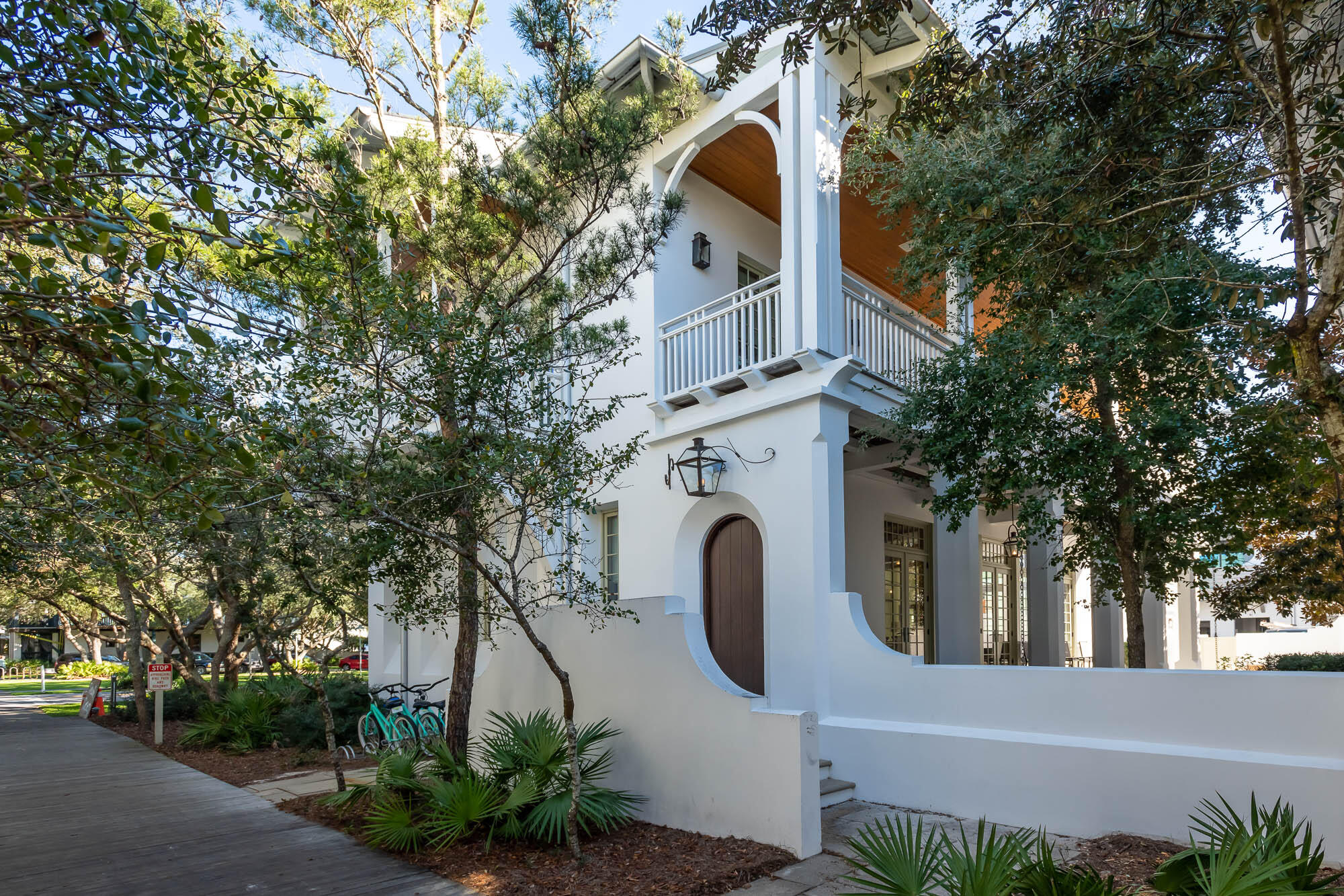 South of 30A! A private enclave in the center of town. Beautifully designed by Domin Bock, this 5 bedroom / 5.5 bath home is a fine example of relaxed coastal living. The first level has large open floor plan featuring a comfortable living and dining area, gourmet kitchen with Calcutta marble, Wolf and Subzero appliances and butler's pantry. Adjacent is a spacious bedroom with an en suite bath. The large expanse of windows flows into the oversized courtyard.  Enjoy outdoor living and entertaining by the private pool, outdoor kitchen, dining and sitting by the fire under the stars.

The second level features the primary bedroom and bath, guest suite, office and laundry and wrap around porches. The third level has a media room with beds, bunks and trundles to sleep up to eight guests.  The carriage house above the two car garage is complete with a bedroom, bath, full kitchen, washer/dryer and a sleeper sofa. Take a short stroll down the boardwalk to the beach. Just steps to shopping and dining. Enoy the lifestyle of Rosemary Beach.