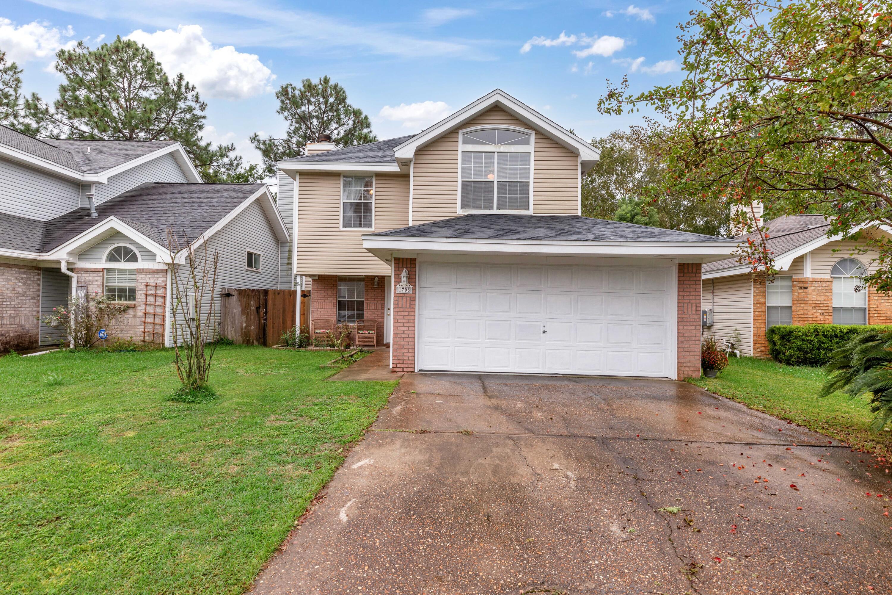 Escape to your peaceful water view yard with this charming single-family home, nestled on an interior lot with no HOA and not in a flood zone. Enjoy serene water views from both the porch and the bedroom window. The partially converted garage offers flexible options-currently providing 1.5 spaces with an office/flex room. The spacious primary bedroom, located upstairs, features an en-suite bathroom with a luxurious jetted soaking tub. This bright and clean home is move-in ready. Owner will fence in back yard with approved offer. Updates completed are Roof (2022) A/C vents (06/22), upgraded vinyl siding/insulation (09/16)