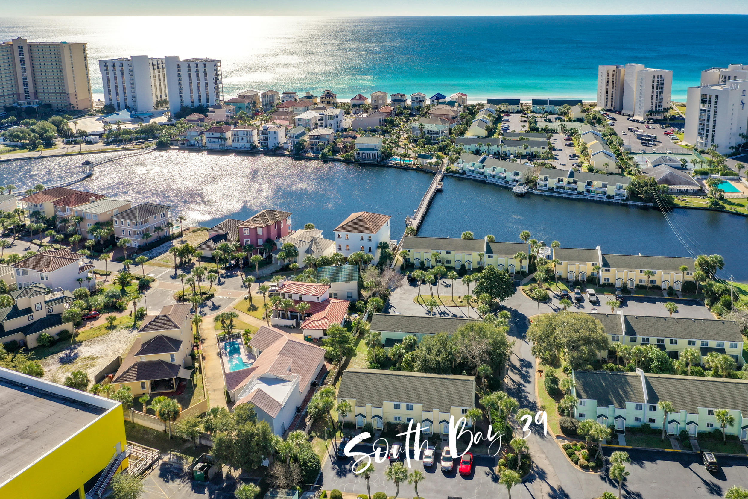 UNDER CONTRACT, SELLER ACCEPTING BACK UP OFFERS
This beautiful, renovated condo at South Bay is located south of 98, has assigned parking at the front door, is located close the pool and is a quick walk to the beautiful beach! This stunner boasts 2 spacious bedrooms, 1.5 renovated bathrooms and a washer/dryer. Similar condos gross $35K+ annually! Updates include: wood laminate and tile flooring, carpet upstairs less than 1 year old, new front storm door, newer hurricane rated windows throughout, renovated bathrooms including a large walk-in shower in the master! Enjoy the many resort style amenities of South Bay: 2 pools, 2 kiddie pools, 5 acre fresh water lake, lighted tennis courts, shuffle board courts, beach side volley ball,  BBQ grilling area and lush grounds made for walking and enjoying the Florida wildlife!