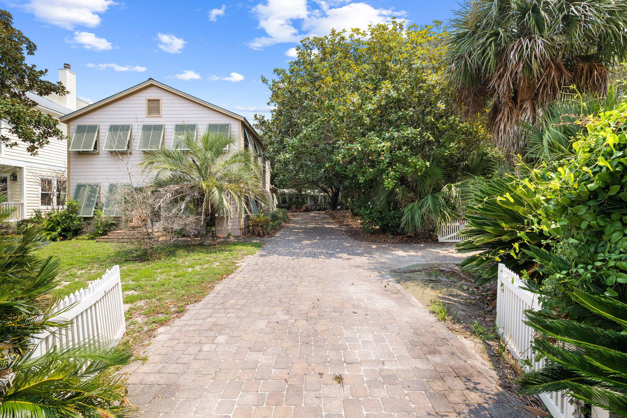 A rare opportunity has arisen to own an oversized corner lot in the coveted Old Seagrove neighborhood, West of 395. This traditional 1980 beach cottage offers three King bedrooms, sleeping porch and two baths. The expansive 70 x 125 sq ft lot is conveniently located steps from two neighborhood beach accesses and a short stroll to the renowned restaurants and shops of Seaside.
Whether you preserve the existing home or embark on a new development increasing the square footage and incorporating Gulf views. This opportunity is as rare as it is extraordinary.

Plans available for remodel & addition for  current home.
