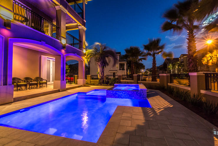 Ideally located across from the boardwalk leading to the warm beaches of the Gulf of Mexico, here you will find an exceptional 6 bedroom, 5 -1/2 bath home in the prestigious Destiny by the Sea community. This three level residence on a corner lot boasts private pool, spa with covered patio and built in BBQ, perfect for entertaining. The main living area on the 2nd floor offers beautiful architectural details blended with highly upgraded modern finishes, including a state of the art kitchen featuring stainless steel appliances, granite counters and breakfast bar. The spacious family room and dining area leads to one of three balconies all with gulf views. The master retreat with fireplace has a spa like ensuite bath complete with walk in shower and jetted tub. Additional bedrooms provide plenty of room for family and guests. Amenities feature elevator to all three stories, oversized garage, security system and community pool across the street. Whether used as a year round home, vacation property or rental investment, this property offers quintessential beach living at its finest.