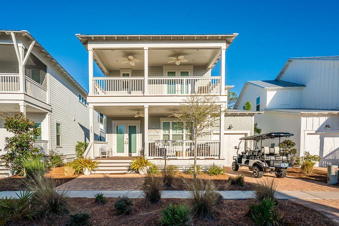 Settled in the gorgeous NatureWalk at Seagrove community, this 2-story Florida cottage is professionally decorated with new furnishings, electronics and includes a brand new (2021) 6 seater golf cart.  Sleeps 14. This stunning property would be a lucrative investment for any second home or vacation rental. Two guest suites, a custom bunk room with 4 queen beds and private bath. An open and airy master suite, and luxury bathroom, complete with a soaker tub and separate walk-in shower, to be a place of rejuvenation and relaxation. The expansive kitchen showcases stunning Carrera marble countertops, shaker style cabinets all the way to the ceiling, subway tile backsplash, built in appliances including gas cooktop.  Wide open living, kitchen, dining perfect for entertaining. Gas fireplace with matching Carrera marble surround.  Screened porch overlooking the pond. Prime location near 30A and Seaside! This premier location offers accessibility to area restaurants and Publix just right next door. Amenities in community include a trail to the beach - just under 1 mile, The Gathering Place is centrally located and features a playground, heated lap pool, zero entry pool, hot tub, fire pit, grills, tv, bar area for parties and plenty of seating. Other community amenities include fitness stations, multi-purpose courts, pickleball, and trails throughout.