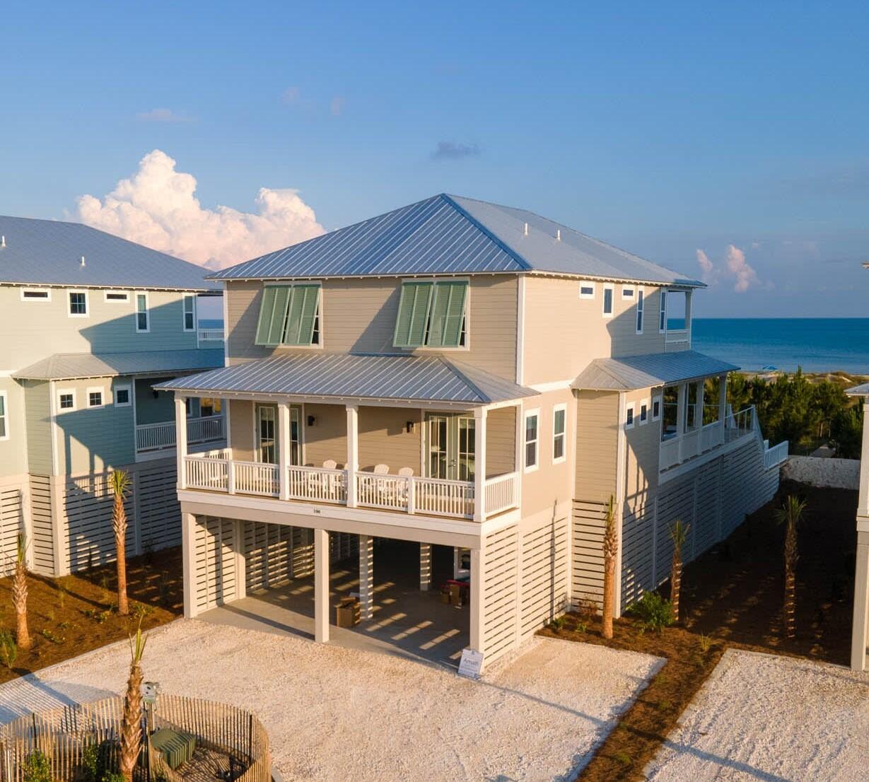 New 2023 Construction! Elevated Pool With Oceanfront Views!

With two large decks overlooking the Gulf, your own private pool, and the sugar sand beach and clear blue water just feet away, Amalfi Beach House is the perfect vacation spot in the Villa del Sol subdivision. This 3,300 square foot 5 bedroom 5 bath vacation home owned by Bella Coastal Rentals with an elevated pool and elevator was built in 2023 in a lovely private gated subdivision.

Amalfi truly captures the essence of all things coastal. You will be greeted with a large, open concept living and kitchen space boasting spectacular Gulf views. Take a step through the back doors facing the ocean to find yourself in the peaceful, breezy surroundings with an amazing, unhindered view of the Gulf and your own private elevated swimming pool. Back inside, the dining and kitchen area has beautiful hardwood floors, modern amenities, and a kitchen featuring a large island, appliances, and quartz countertops. The comfortable, roomy living space is the ultimate gathering spot for entertaining and making memories with friends and family.

The first floor has a 1 bay view master suite with a king bed and attached private bathroom along with a bay view master bedroom with king bed. On the second floor, there are two Oceanfront master suite bedrooms with king beds and attached bathrooms, and a charming bunk room with 3 bunks and a full bathroom. The most inviting aspect of the second floor is that two of the bedrooms have access to its large deck overlooking the Gulf, while the bunk room has views of the bay.

Walk down your own boardwalk from your coastal home and you'll find yourself on the miles and miles of sugar-white sand and pristine blue water of the Gulf of Mexico. Whether you enjoy combing the beach for shells, snorkeling, kayaking, sunbathing, surfing waves, fishing, or taking a leisurely stroll or horseback rides along the shoreline, you'll spend hours of fun while soaking up the sun. Venture out to enjoy shopping, galleries, entertainment, and restaurants in the quaint downtown of Port St. Joe located only 15 minutes away. Visit the historic lighthouse, visit the shops, have lunch or dinner, or take the ferry over to St. Vincent Island for the day. For the fishing enthusiast, launch your boat at the nearby Indian Pass boat ramp and take in some first-class fishing, or book your family on a fishing charter for a day trip out on the water to catch your dinner for the night. When you want to experience the beauty of St. Joseph Bay, visit nearby Salinas Park with a playground, picnic table, fire pit, and boardwalk over the serene water. You can even get in some exercise by walking, running, or biking on the 19-mile paved trail. About 25 miles away is the quaint, historical, fishing community of Apalachicola. Apalach is perfect for a day trip to do a little shopping, stroll along the Apalachicola River, or grab some of the best seafood around!
The Space
Ground Floor
 " Parking for 5 vehicles in driveway
 " Elevator
 " Ice Machine

First Floor
 " Living Room
 " Dining Room
 " Kitchen
 " Laundry Room
 " 1 Master Bedroom with King Bed and Deck with Bay Views
 " 1 Full Bathroom
 " 1 Master Suite with King Bed and Deck with Bay Views
 " Deck with Private Pool 

Second Floor
 " 2 Oceanfront Master Suites with King Beds and Deck and full Oceanfront views
 " 1 Bunk Room with 3 bunk beds - 2 bunk beds with Full over Queen mattresses and 1 bunk bed with twin over twin mattresses with an attached full bathroom with shower/tub

Neighborhood
Villa del Sol has Gulf and Bay views and is just steps to pet friendly beaches & St Joseph Bay. Neighborhood amenities include gated entrance, brick paved streets, boardwalk beach access, a community pool and two pickleball courts. Kayak & fish from the shoreline or walk the beach for seashells & wildlife. Visit nearby family friendly Salinas Park for pickleball courts & horseback riding or trek miles of paved walking & bike trails.