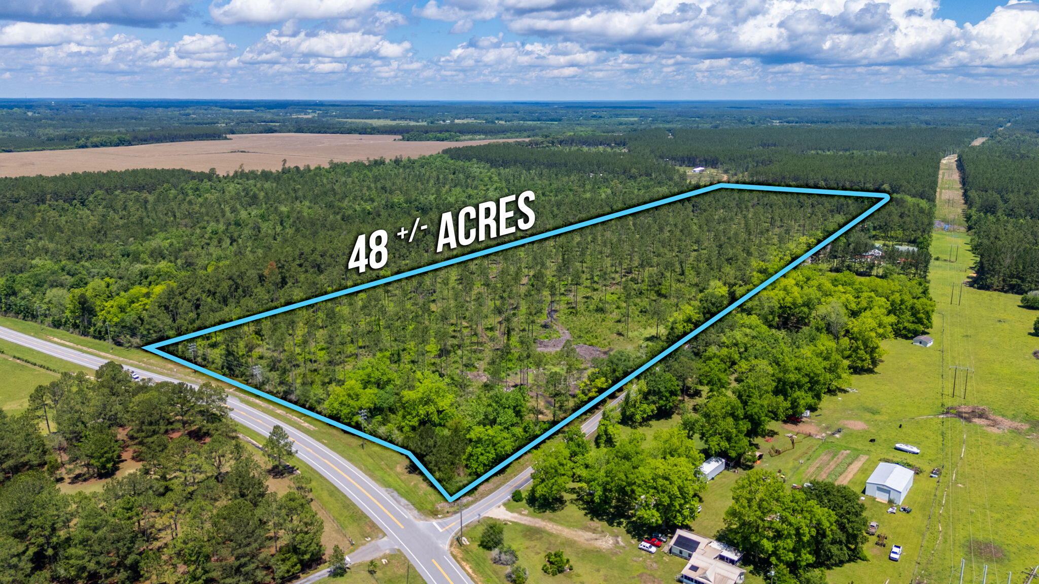 NEW PRICE - Located in the North part of Walton County on Co Hwy 0605 and Sandy Ramp Road, this 48.38 acre parcel is wooded with paved road frontage on 3 sides. Public water from the City of Paxton is available on the front portion of the property closest to Hwy 0605.  An old septic system is also near the front. Electricity and telephone are also available on the property. Property is a rich, dark soil - excellent for growing trees, crops, etc. Property is all Zone X (no wetlands). Land use is Agriculture. Property is located in the Paxton School District ( A+, K-12 School). Also, just a few miles from Lake Jackson, a park offering swimming, boating, fishing, picnics plus all water activities.

****DO NOT GO ON PROPERTY WITHOUT APPOINTMENT - IT IS HUNTING SEASON!