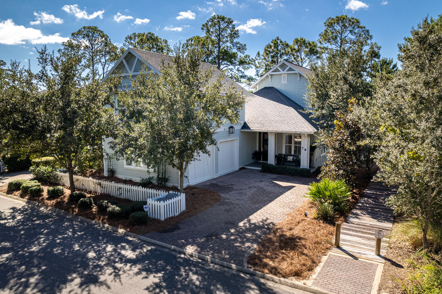 Under contract with 72 hour kick out clause. Stunning lake front home south of 30A in Watersound West Beach.  The calming color palette, soothing decor and functional floor plan exudes warmth, comfort and elegance.  The oversized screened porches on both the first and second level overlooking a tranquil lake expand the living space for entertaining or create space for relaxing with your favorite book and beverage.  The gated entry, neighborhood trails, community pool, deeded beach access and prime location on 30a will enhance your 30A lifestyle.  If its just you.. the home lives large and easy with master on main, if your pack is larger there are 4 additional en suite bedrooms, two with porch access and a carriage home with private entry, full kitchen.... your guests wont want to leave.