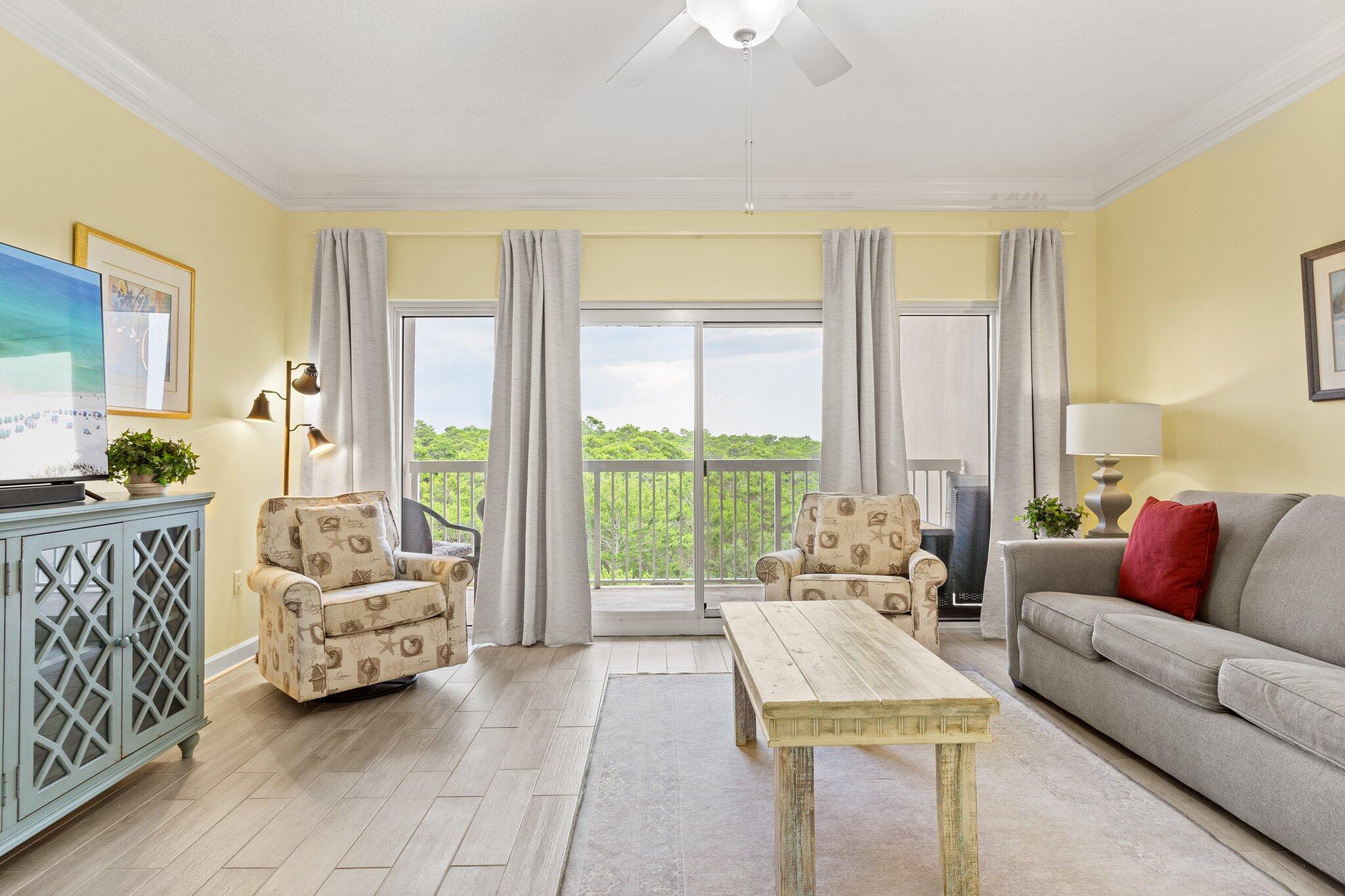 Completely renovated with new furnishings and finishes, this coastal chic 2BR/2BA condo is located on the east wing of the Summit at Tops'l Beach and Racquet Resort. This is truly a dream vacation condo!  With views of the nature preserve from the living room and master bedroom, you will enjoy a quiet location just a short 200 yard stroll to the sugar white Tops'l beach, and the pool is just downstairs.