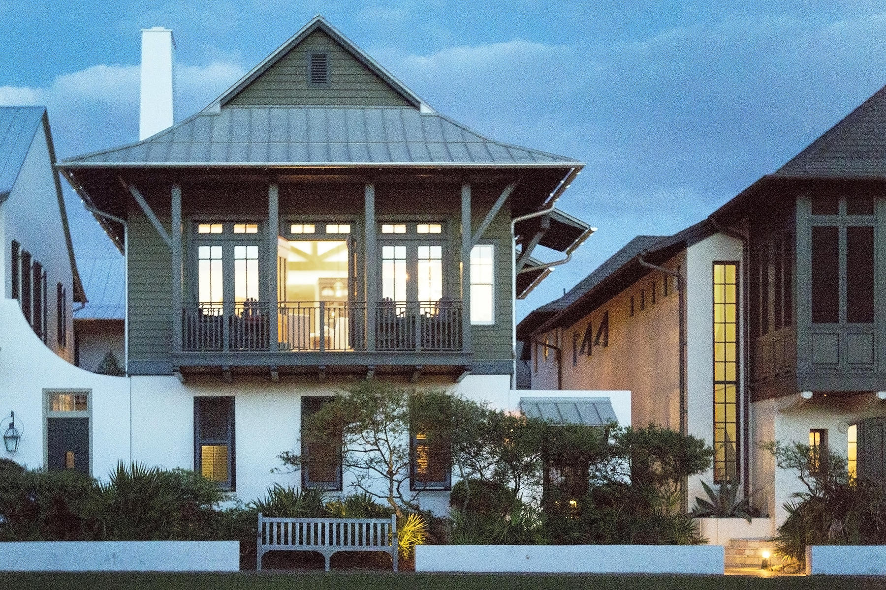''Hopetown On The Green''; the box seat at the opera overlooking Rosemary's beautiful Western Green and the Emerald Waters of The Gulf of Mexico! This warm, inviting, four bedroom, Bahama influenced courtyard home designed by Architect, Tom Christ is located just one back from the gulf and offers privacy along with stunning views right in the middle of Rosemary Beach Florida! A well planned side courtyard features lush landscaping, a beautiful fountain by the main entry a tiled first floor porch with seating area, wood burning fireplace, prep sink and gas grill. Located immediately off the home's main first floor entry is an oversized King Master Suite with in-suite bath and a separate very generous sized walk-in closet. The luxurious master bath includes travertine tile, a spacious walk in shower and "His & Hers" style vanities with Kohler fixtures.  The first floor also features a king guest bedroom with courtyard views, built-in Media/Book case and separate bath in the adjoining hall.  A powder room and a full laundry room with pine cabinetry round out the first floor.   The second floor of "Hopetown on the Green" is where all the entertaining, fun and living happen!   An open 'great room" styled area encompasses a dining area, living room and gourmet kitchen and features fabulous vaulted, wood beamed ceilings and a gas fireplace.  A dramatic bank of windows and French doors provides wonderful views over Western Green and the gulf.  A second floor porch off the main living area makes the ideal location for watching sunset or families play on the green below where life in Rosemary happens daily.