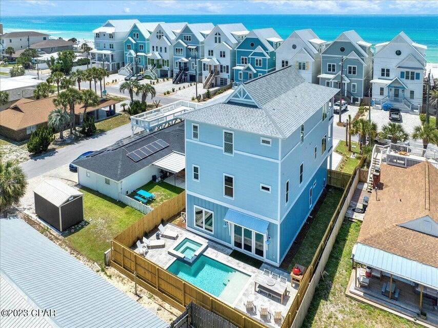 New Construction, this 7 bedroom, 7 bath with a rec room is designed to be a rental machine and sleeps 24.  just footsteps away from the Gulf.  This Beach house is designed to maximize your rental income with plenty of break out areas for your guest and a pool and outdoor cooking area as well.  The house is fully furnished and already on rental with Ben's Beach Homes.