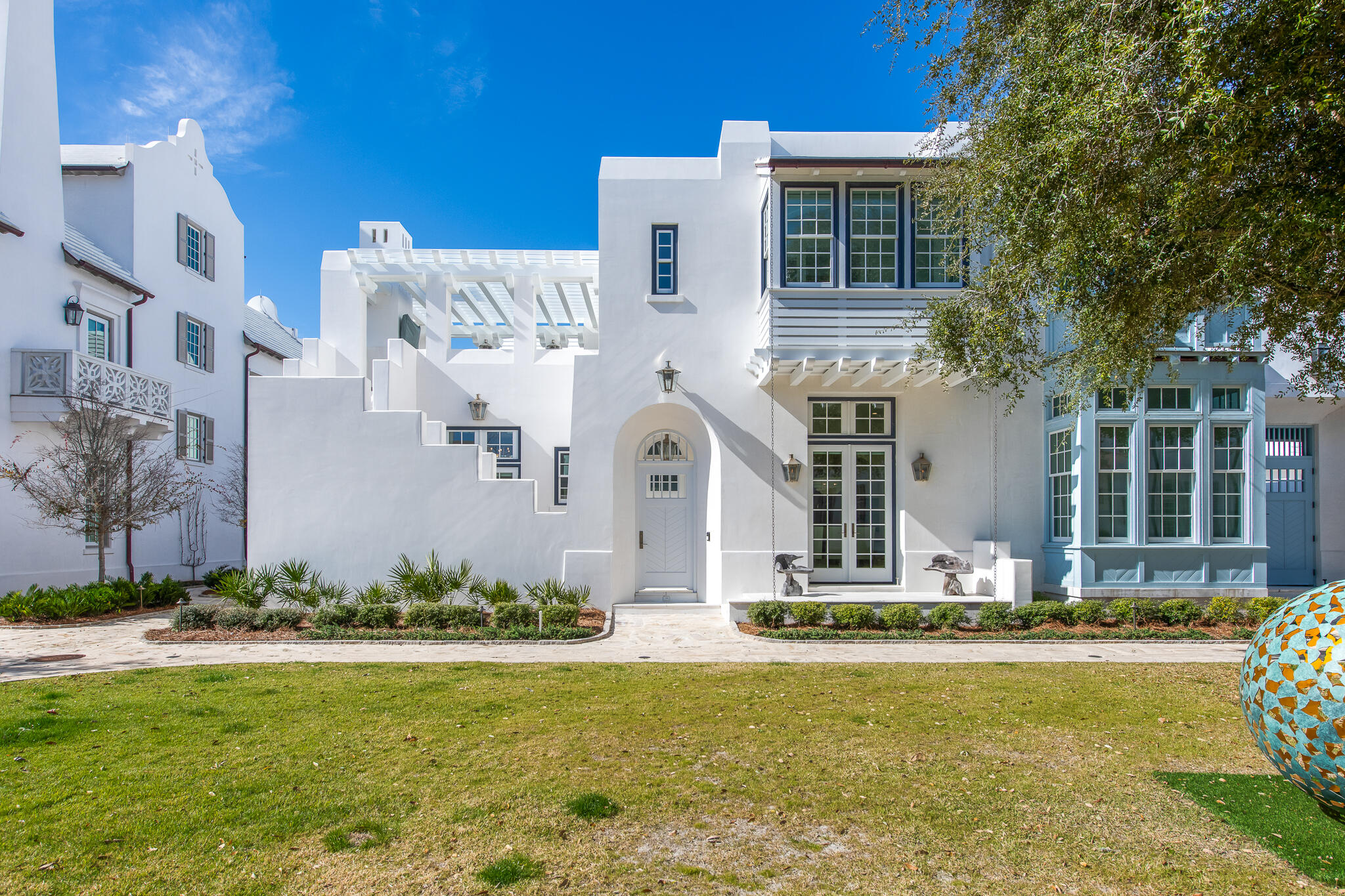 Embrace the seamless blend of indoor and outdoor living in this stunning home at 40 Smugglers Alley in Alys Beach, designed by acclaimed architect Jason R. Dunham. Situated on a premium corner lot fronting Turtle Bale Park and a southern pedestrian path, this residence boasts an abundance of natural light and expansive outdoor spaces. As you enter the home, you are greeted by a serene entry court featuring a tranquil water feature, creating an inviting atmosphere. This area is gated for added privacy and includes exterior stairs that lead to the second-level roof terrace, enhancing the connection between the indoor and outdoor living.
With 3,674 square feet of conditioned living space, the home features four bedrooms, each with en-suite bathrooms, including two luxurious primary suitesone on the first floor with the main Primary suite on the second.  Cascading Dolomiti Honed Marble honors each of the primary suite's oasis-like bathrooms. The interiors are professionally decorated, exuding elegance and comfort, with exquisite rice white Peacock Paver flooring on the first floor and coastal stained wood flooring on the second.  Intentional thought was given to each space throughout the home leading with the gourmet kitchen featuring a 48" Thermador range with cascading Zellige tile backsplash. 

Outdoor living is truly an extension of the home's design, highlighted by an expansive first-level courtyard that includes a private pool and a covered outdoor kitchen, perfect for entertaining. The second-level terrace, complete with an outdoor fireplace and beverage center, creates an unparalleled atmosphere for gathering under the stars. Multiple indoor living spaces include two den areasone on each floorthat can adapt for work, play, or quiet retreats, complemented by the home's main living room that fosters an inviting ambiance with a fireplace cast in Venetian Plaster.  

40 Smugglers Alley is within proximity to the newly completed Silva Pool & Restaurant amenity opening in March.  Passage to and from are connected by Alys Beach's renowned walkable pedestrian paths.  This Fortified for Safer Living built home honors sustainability with its white concrete masonry construction, combining style with environmental consciousness. Fully automated systems, including automated window treatments & audio visual systerm, add to the effortless living experience. Offered fully furnished, this property provides a turnkey opportunity for those seeking a sophisticated coastal lifestyle in Alys Beach, renowned for its beautiful surroundings and world-class amenities. Don't miss your chance to experience the unmatched beauty and sophistication of this extraordinary coastal retreat!
