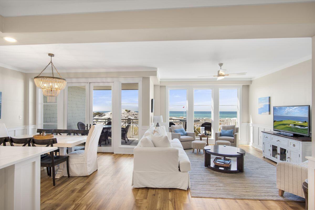 Experience gulf-front living with inspiring views and updated interiors from this two-story Watersound Crossings condominium home. Ideally positioned steps from the gulf and undisturbed dunes, this condo has over 2100 square feet of living space, gourmet kitchen, private elevator, and balconies on both levels. The condo accommodates large groups with 3 spacious bedrooms plus a bunk area. A 2022 renovation features an updated kitchen with Calcutta Borghini Quartz counters, Soho Studio marble and ceramic backsplash, new dual fuel Wolf Range, new sink and gold Delta fixtures. All 4 bathrooms boast new cabinets and hardware and the master bathroom  has a free standing soaker tub and dramatic floor to ceiling tile for an elegant touch. Additional upgrades include custom lighting and select new furnishings. Outdoor living seamlessly connects to the boardwalk leading to the dedicated Crossings pool, the picturesque Watersound Bridge and vast undisturbed sand dunes and beach. As a bonus, this unit comes with an attached garage.Enjoy dune lake access for paddling and kayaks, boardwalks, fitness center and multiple pools.