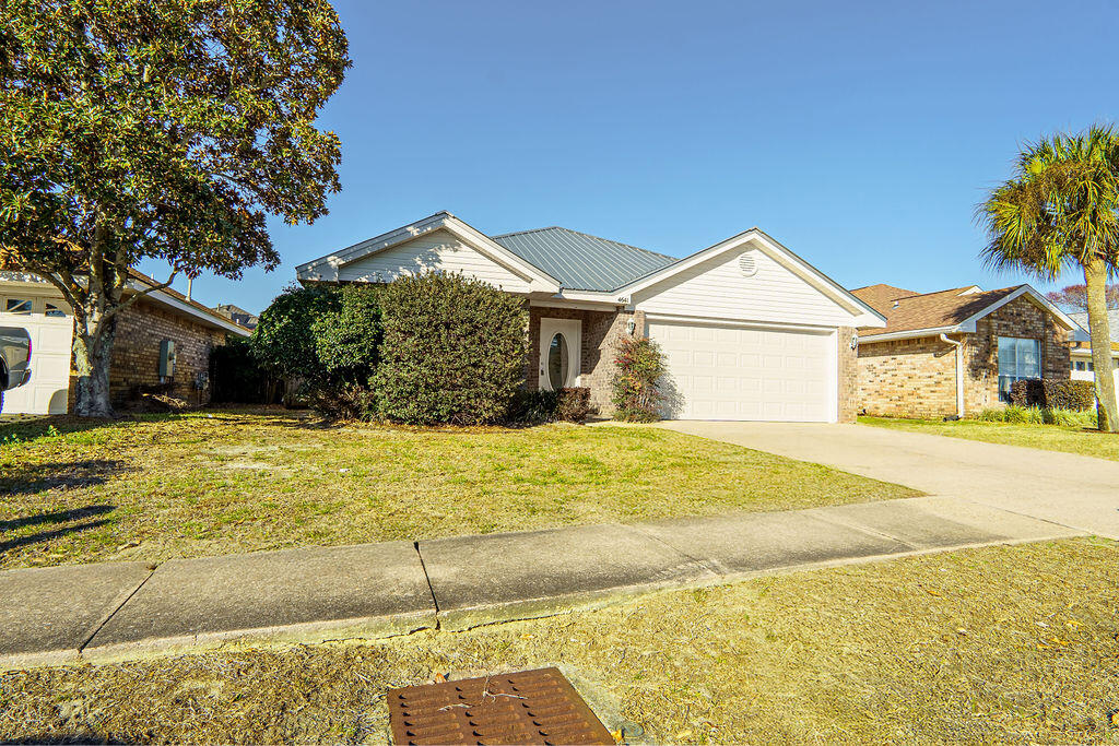 SUBDIVISION IS GREAT FOR THOSE LOOKING FOR A LOW MAINTENANCE YARD. Location, Location, Location. Just blocks from the beach and Destin Commons. Quiet subdivision in convenient location. 3 bedroom home with fenced yard. This home built in 2000, is in very good condition and is ready to move into. Sunsail has a community pool for that relaxing dip before or after shopping or swimming in the Gulf. Very low HOA fees of $420 annually. Buyer to verify all measurement and information. Motivated seller !  Roof replaced 8/2023,garage door replaced 7/2023, water heater replaced 12/2022, new LVP throughout 10/2022, new kitchen countertops  10//2022, A.C. is 2009