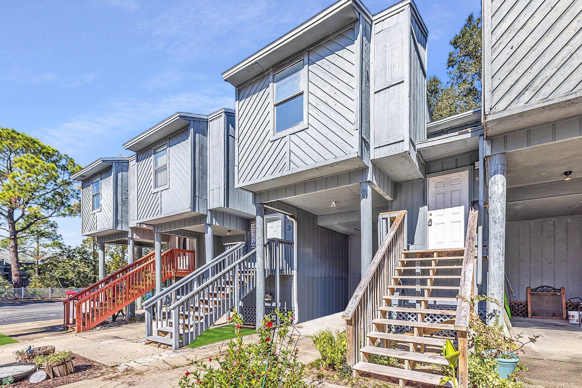 Come enjoy your own slice of paradise in this lovely 2 bedroom, 2 bath town home with views of the bay!  Excellent location close to Eglin AFB, restaurants, and shopping. This home features a spacious living room/dining room combo with sliding glass doors to the balcony. The kitchen has granite countertops, white cabinets, stainless appliances and a pass thru to the dining area. The spacious master bedroom is conveniently located on the lower level and has its own en suite bathroom and sliding glass doors that lead to the private deck. The second bedroom and bathroom are upstairs. This home also has a laundry closet on the first floor. The floors are laminate and tile throughout. There is a resort-style common area that is the perfect place to relax and unwind after a long day. Take a seat on the comfortable porch swing and enjoy the gentle breeze. Or, gather around the fire pit for a cozy campfire and don't forget to check out the dock, where you can watch the stunning sunsets over the water. Perfect for anyone looking for a home with great views in a good location. Roof is HWH 2020 and HVAC 2019. Washer and Dryer convey!