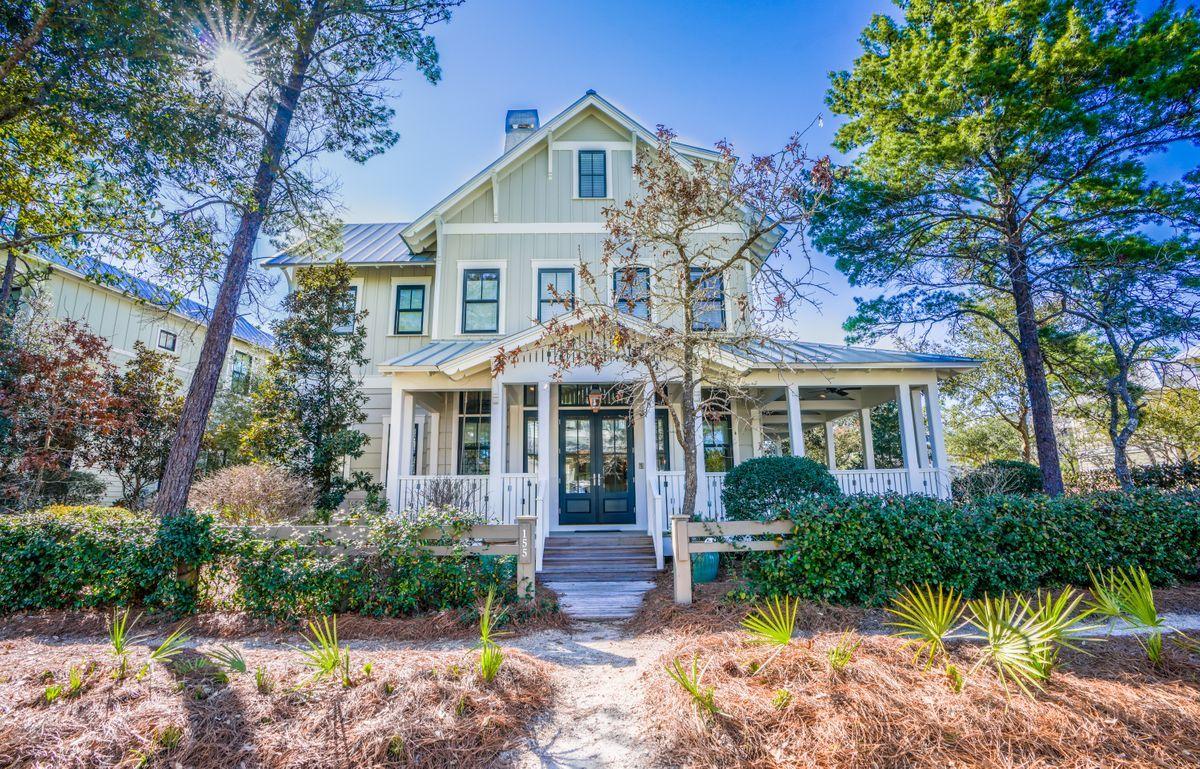 Situated in the beautiful residential oasis of Watercolor, this elegant home is ideal as a vacation home or investment rental. Originally designed as the personal nirvana for builder Borges Brooks, no expense was spared in creating this exceptional home which even has its own generator. The traditional exterior belies the bespoke interior which combines century-old antique pine floors with a state-of-the-art kitchen boasting a travertine back-splash and Subzero appliances. The attractive Annapolis granite counters are top quality, interspersed with Fischer Pakel and DCS appliances including a built-in wine cooler and ice maker. Start the day at the center island bar, enjoying a tasty home-cooked breakfast while making plans for the day. There's an adjoining dining area with suspended chandelier for entertaining in opulent style. An open doorway leads into a welcoming sitting area with open fireplace for cooler evenings. The deep coffered ceiling and wood-clad walls are painted white to enhance the effect of natural daylight. Climb the wood-tread stairs to find beautifully appointed bedrooms spread over two upper floors including a spacious bunk room. Outdoor living extends beyond the screen porches and outdoor fireplace to the heated spa pool with waterfall, built-in grill and sink. The independent carriage house opens up more possibilities. Situated over a two-car garage, it has a full kitchen, bedroom, bathroom and loft with ample space to sleep five. This one-of-a-kind home is part of WaterColor, an award winning community with swimming pools and trails designed for eco-friendly transport around the area by golf cart or bicycle. Go kayaking and paddle boarding or play tennis without even leaving the resort. WaterColor Crossings is a hub for shopping and dining and the white sands at Seagrove Beach are just a mile away. Walking, hiking, swimming, golf and enjoying nature are all part of living in this prestigious Gulf-front community in Santa Rosa Beach.