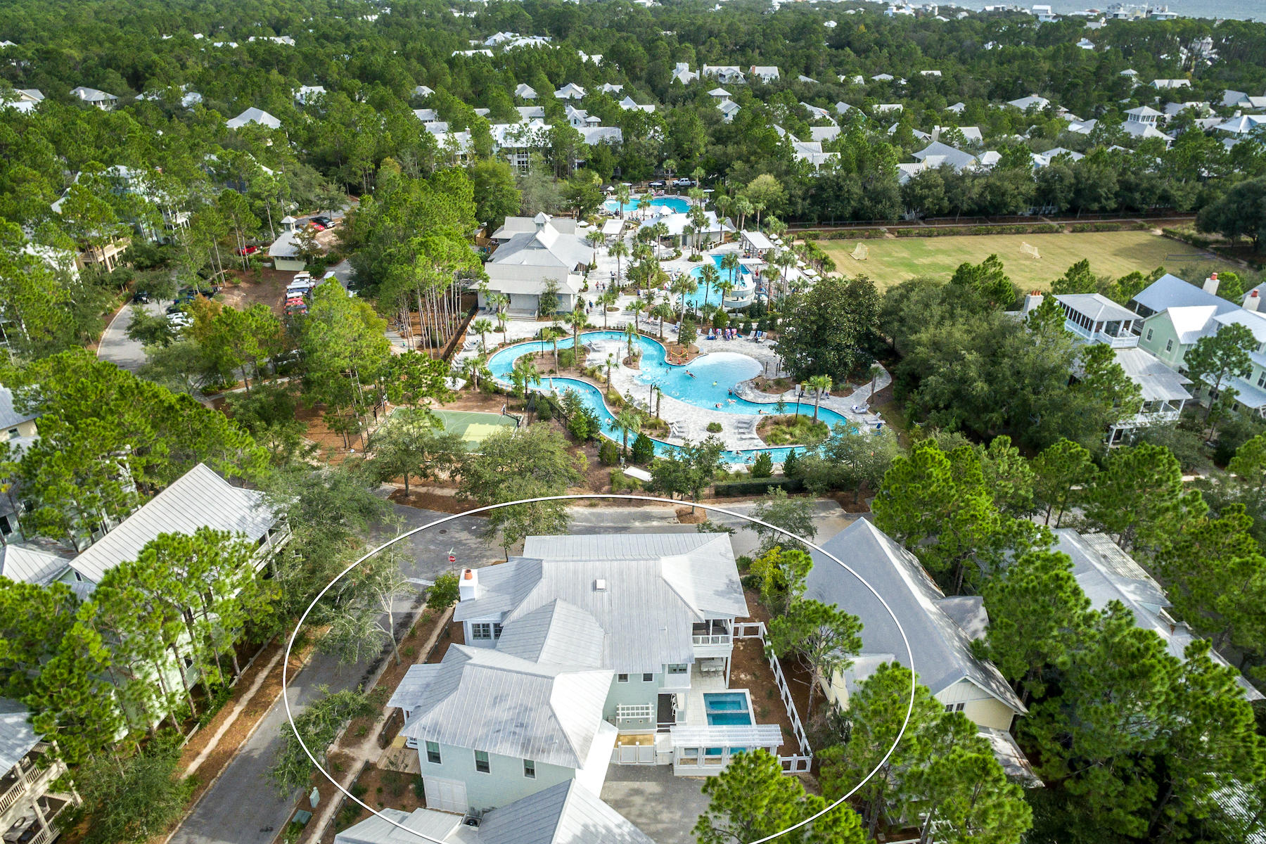 Overlooking the newly completed lazy river lies one of the finest of Watercolor experiences on one of the largest lots, uniquely private in nature. Completing a full interior and exterior renovation, no stone was unturned and no expense spared in this 4 bedroom plus bunk room home creating a masterpiece suitable for the exemplary palette. Fine interiors include exclusive finishes such as bleached Brazilian hardwoods, quartzite countertops, marble baths and indoor/outdoor furnishing with custom window treatments by Bartlett Designs. The open concept living is an entertainers delight with a true chefs kitchen featuring a gas Wolf range and massive center island. New outdoor living area created by Horton Landworks includes a large pool/spa with copper pool scuppers, peacock pavers.. summer kitchen with two quartzite topped bars and exquisite sitting areas.  Capturing the essence of Watercolor, enjoy the view of Camp Watercolor from the privacy of your 1,300 sq ft of porches.  This highly amenitized home also includes a two car garage and an additional controlled storage area.  Missing nothing, experience for yourself all that is Watercolor.