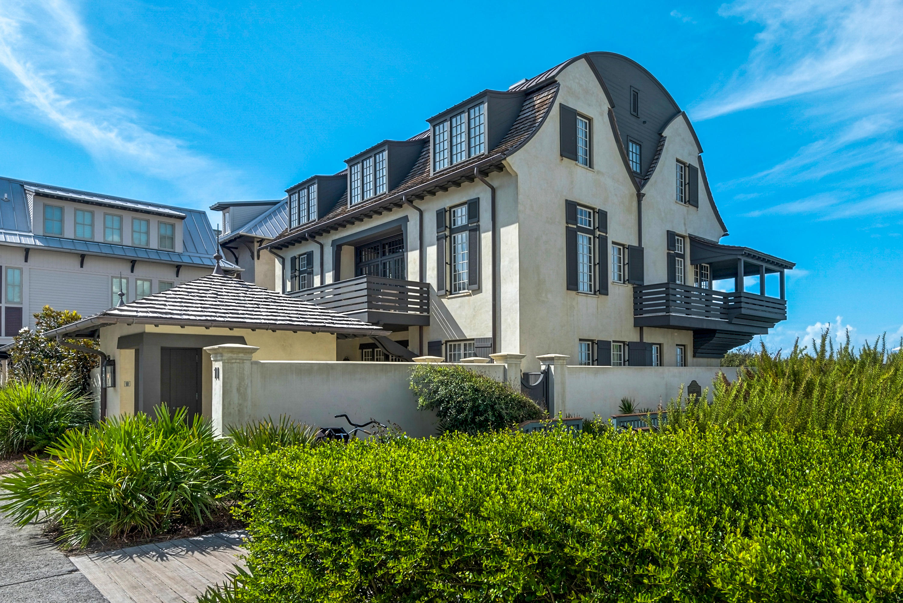 This dynamic, classic McAlpine designed home graces 66 waterfront feet in iconic Rosemary Beach on the Gulf of Mexico. The courtyard, pool and outdoor living spaces are an elegant prelude to the coastal sophistication within this gulf-front gem. Beautiful shades of driftwood grays, airy sky blues and creamy whites reflect the emerald waters throughout the 5000 square feet. The expansive vaulted living areas encompass the open living room, media room and dining room with sweeping views of the sea blue green waters of the gulf. The kitchen is a chef's delight with rustic cypress cabinets and marble countertops. An expansive master suite has panoramic views with a large sitting area and his and hers en suite baths. This home also hosts five additional guest bedrooms with en suite baths. Information contained within this listing such as square footage, is deemed to be accurate but is not guaranteed. Buyer to verify.
