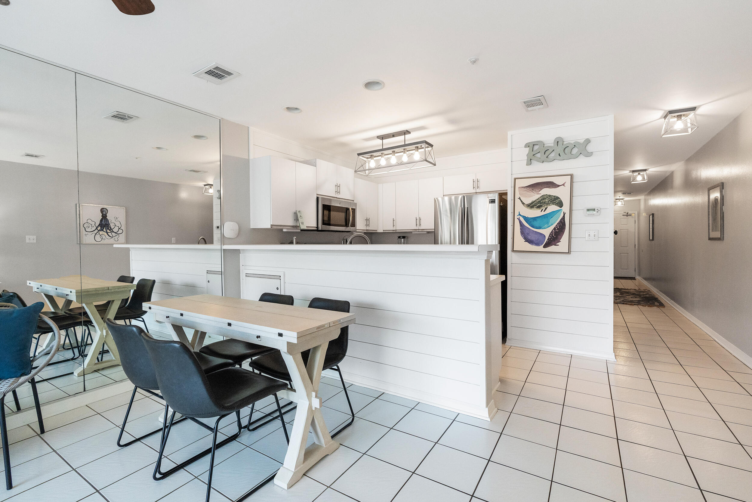 Enjoy coastal charm in this beautifully decorated 1 bed, 1.5 bath condo at Maravilla! This second-floor unit features stylish shiplap accents in the kitchen, stainless steel appliances, and a peekaboo view of the Gulf from your private balcony. Just steps from Maravilla's private  beach with a NEW beach ramp, two swimming pools (one seasonally heated), hot tub, fitness center, tennis and pickleball courts, and clubhouse. A prime location on Scenic Gulf Drive puts you close to everything in Destin while offering the serenity of a gated beachfront community. This resort is PET FRIENDLY for both owners and guests which is a GREAT PLUS! Ideal as a vacation retreat or investment rental! Both SIRS and Milestone has been completed!